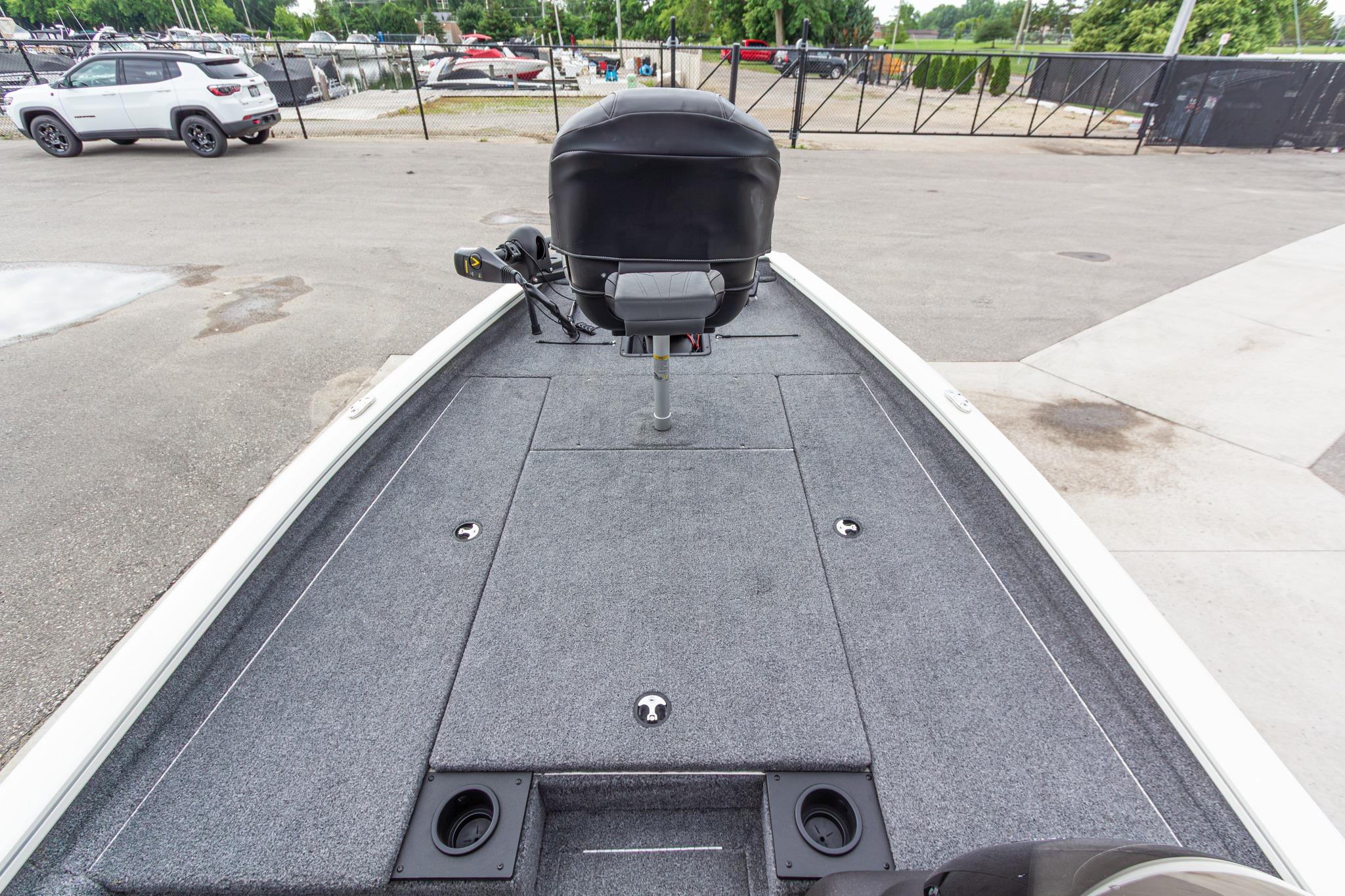 2023 Tracker Pro Team 190 TX boat deck with seating and storage compartments.