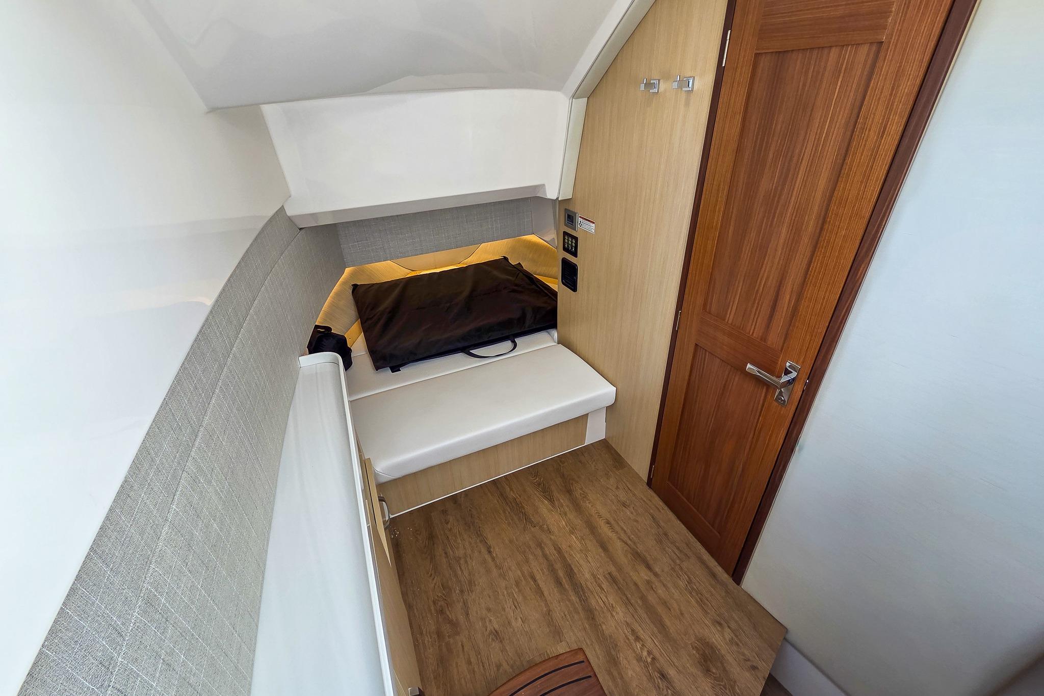 2026 Regal 38 SAV cabin interior with wooden flooring and modern design elements.