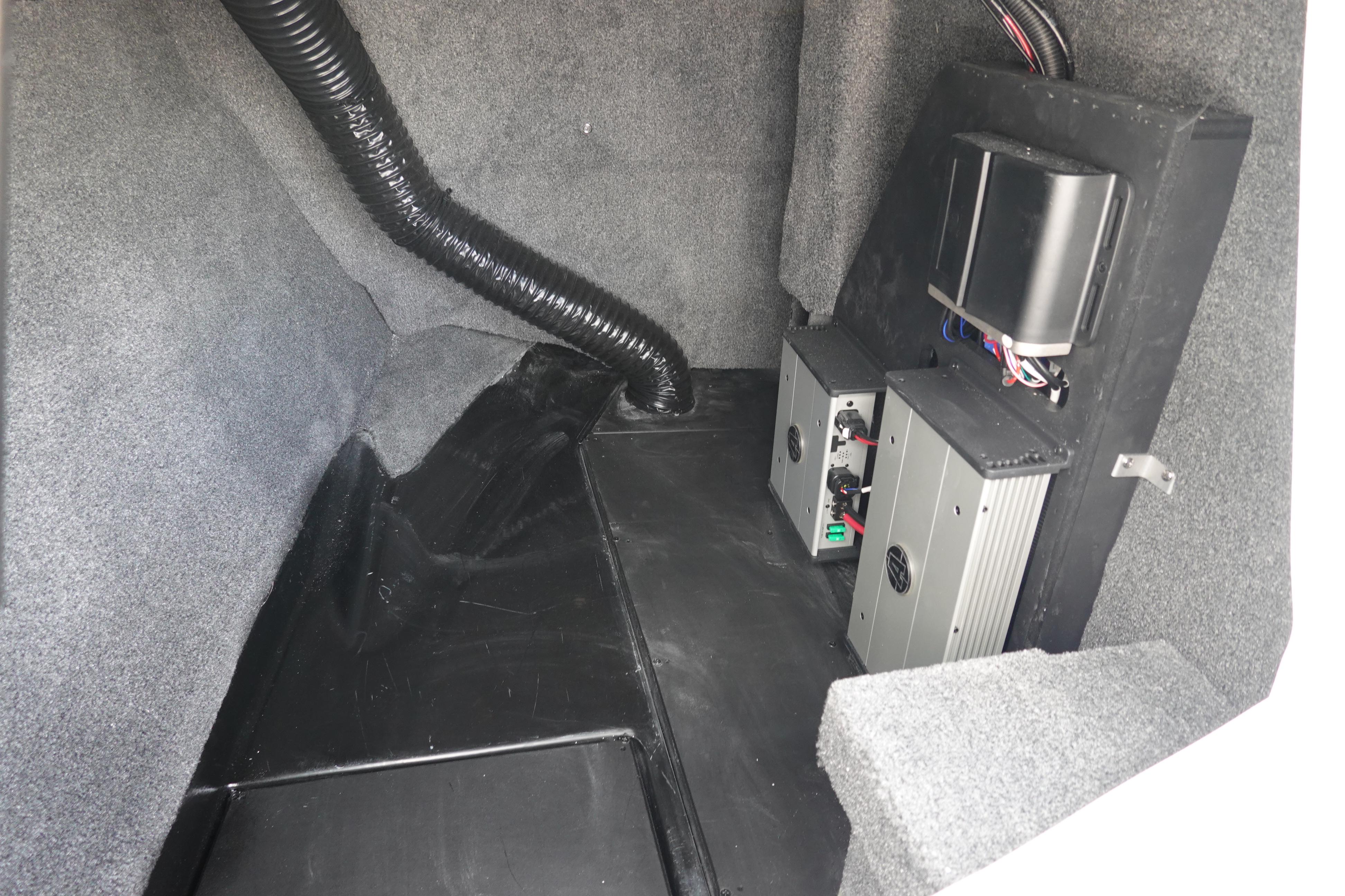 2023 Axis A24 interior compartment with electronic components and wiring.
