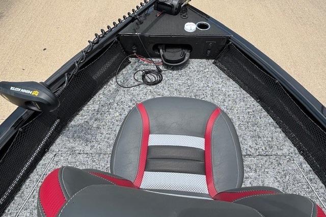 2026 Ranger VS1782SC Angler boat interior with gray and red seating and fishing equipment.