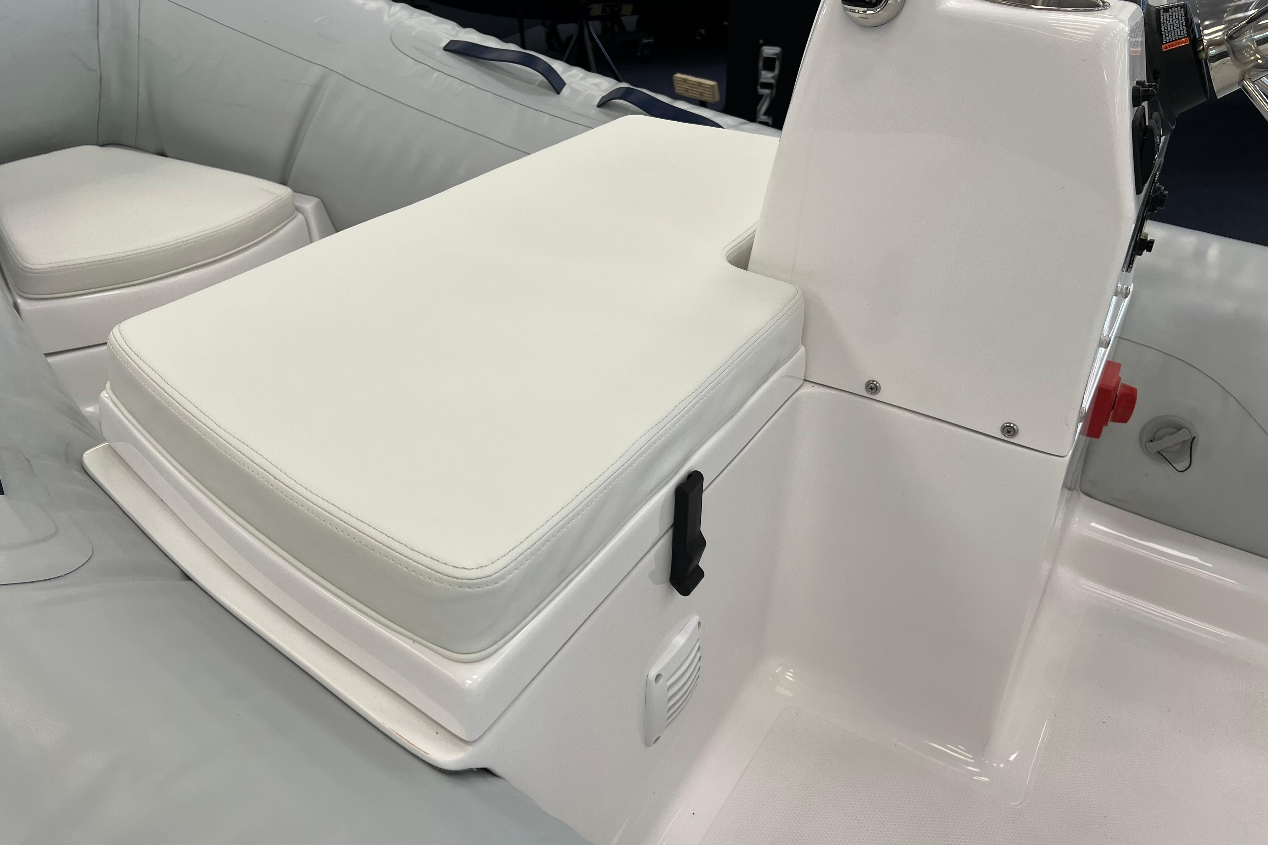 2023 AB Inflatables Mares 12 VSX boat interior with white seating and console.