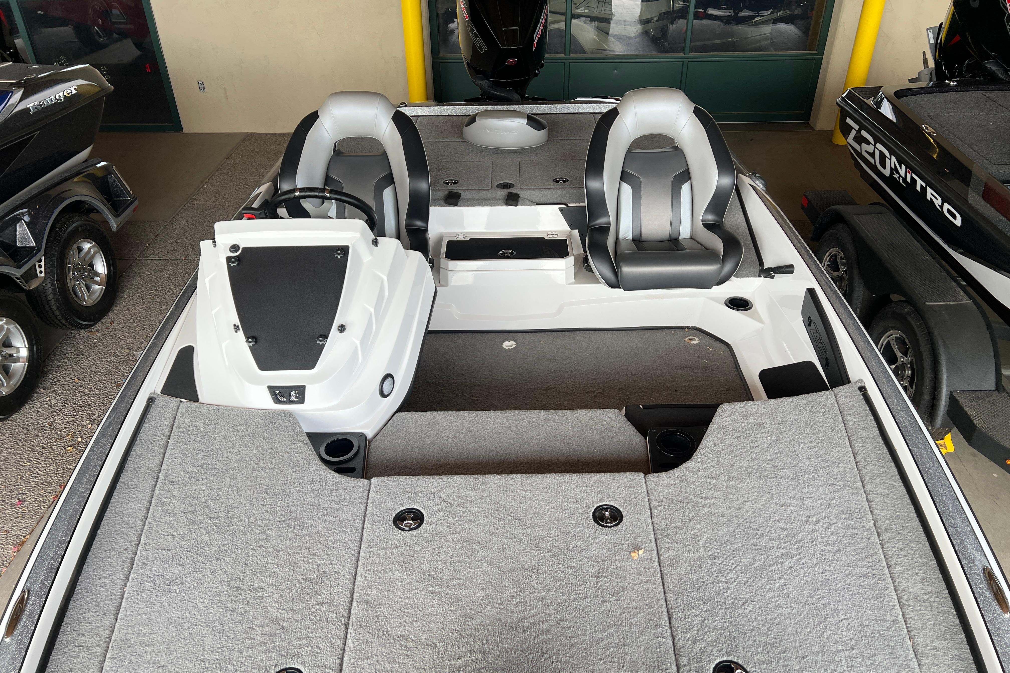 2026 Nitro Z19 XL Pro boat interior with dual seats and steering console.