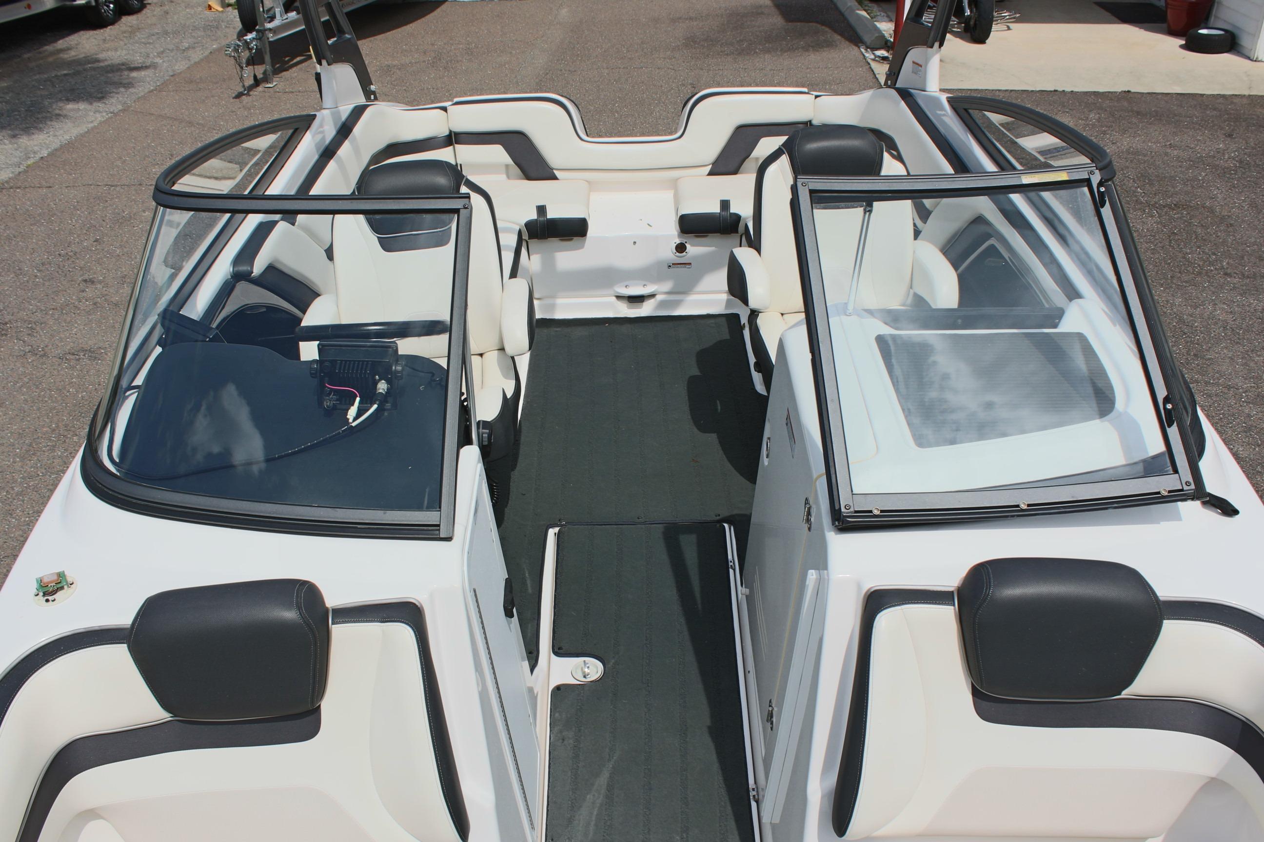 2016 Yamaha Boats 242 Limited S interior with seating and windshield view.