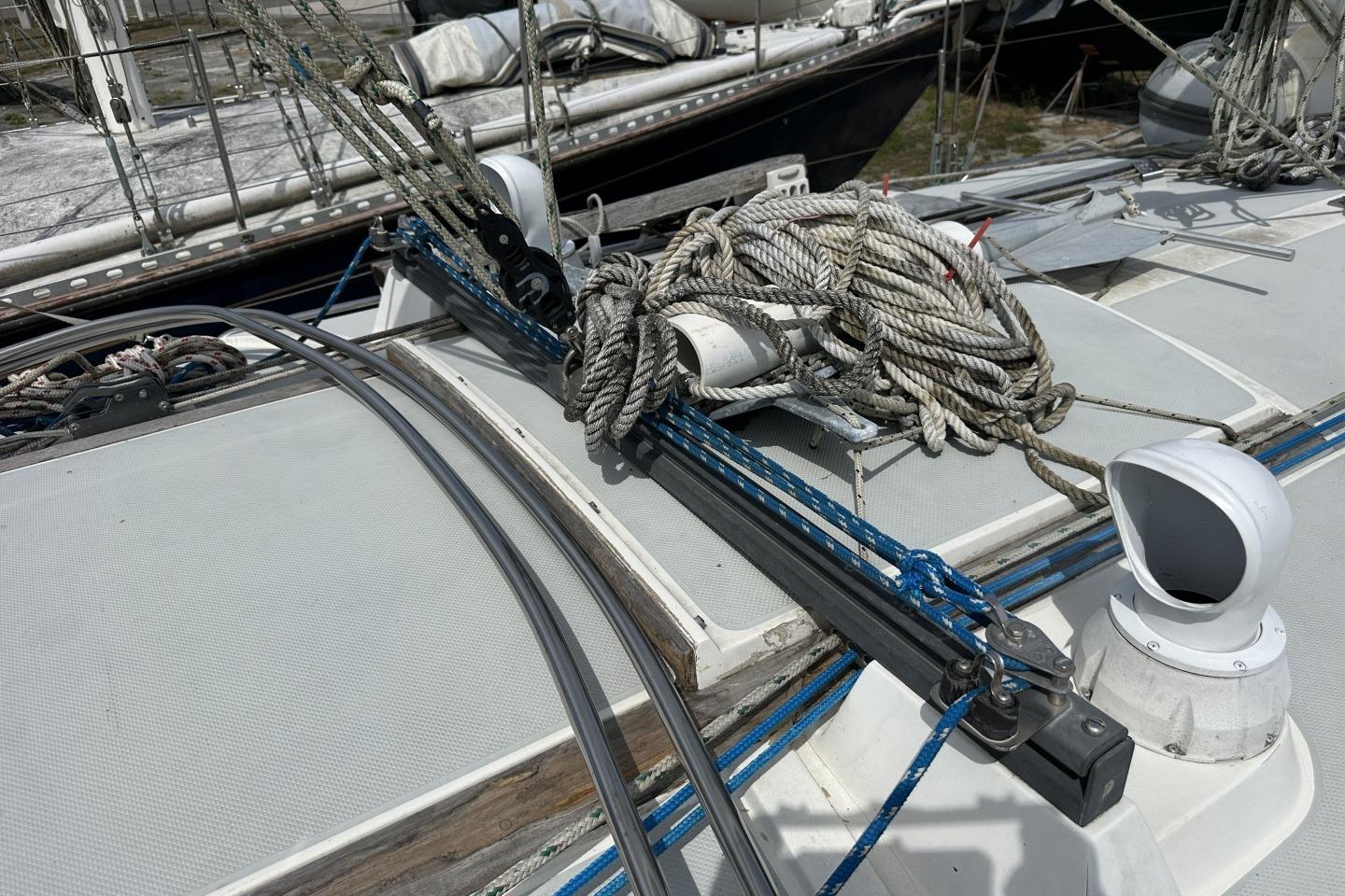 Deck of 1991 Catalina 42 sailboat with ropes and fittings.