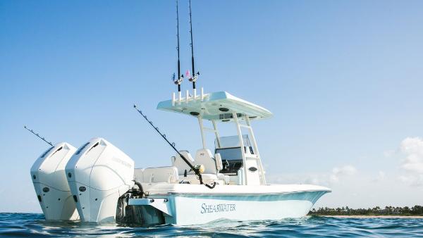 2024 ShearWater 270 SS Open Carolina boat on water with fishing rods.