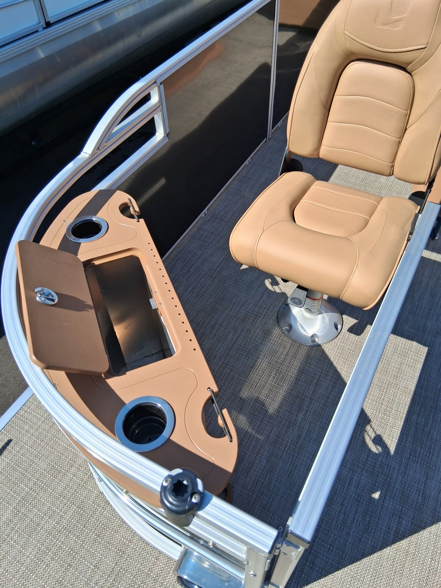 Interior of 2026 Landau Alure 23CC Fish-Charcoal with seat and console.