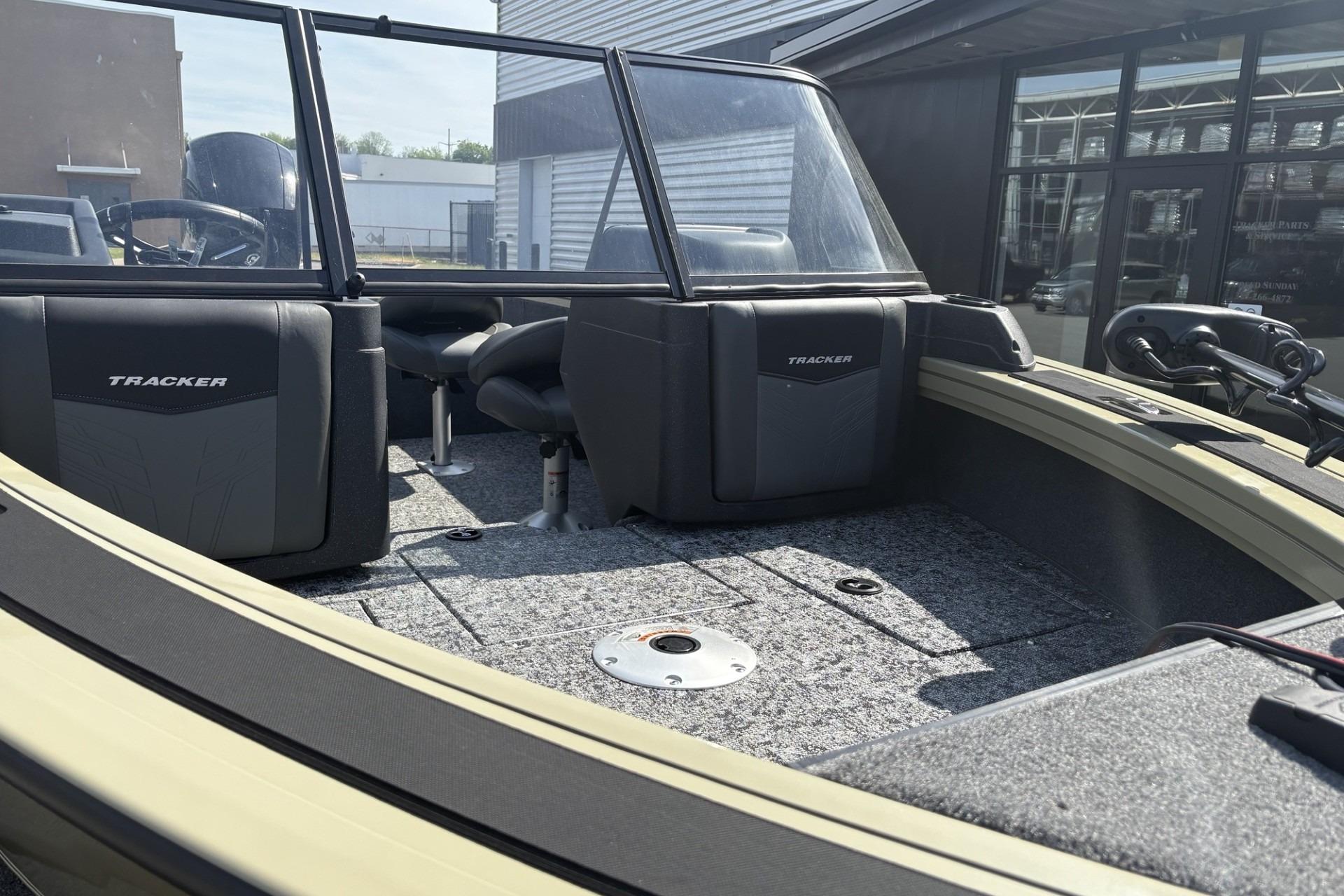 2026 Tracker Targa V-18 Combo boat interior with seating and windshield.