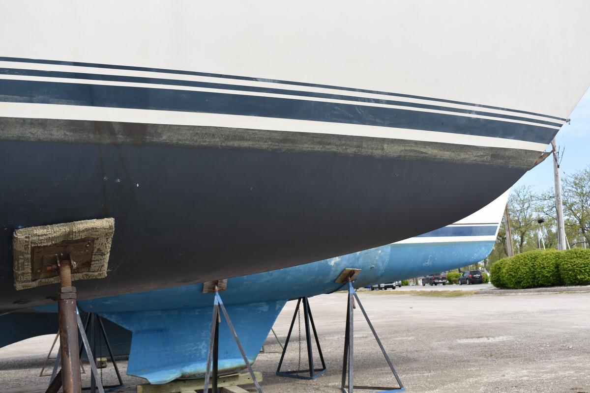 A 1987 S2 9.2A sailboat is on a dry dock.
