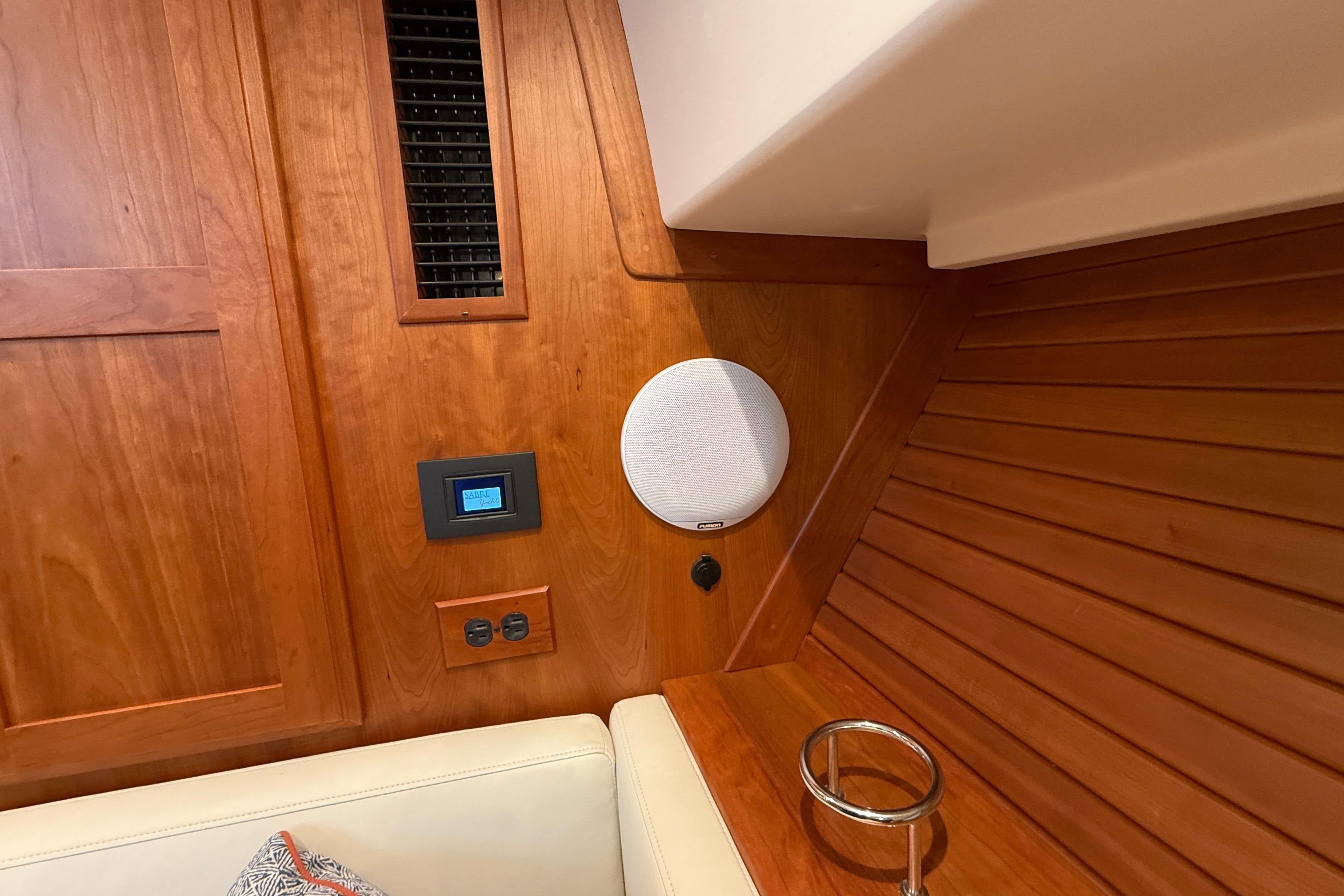 Interior of 2023 Sabre 43 Salon Express with wood paneling and modern amenities.