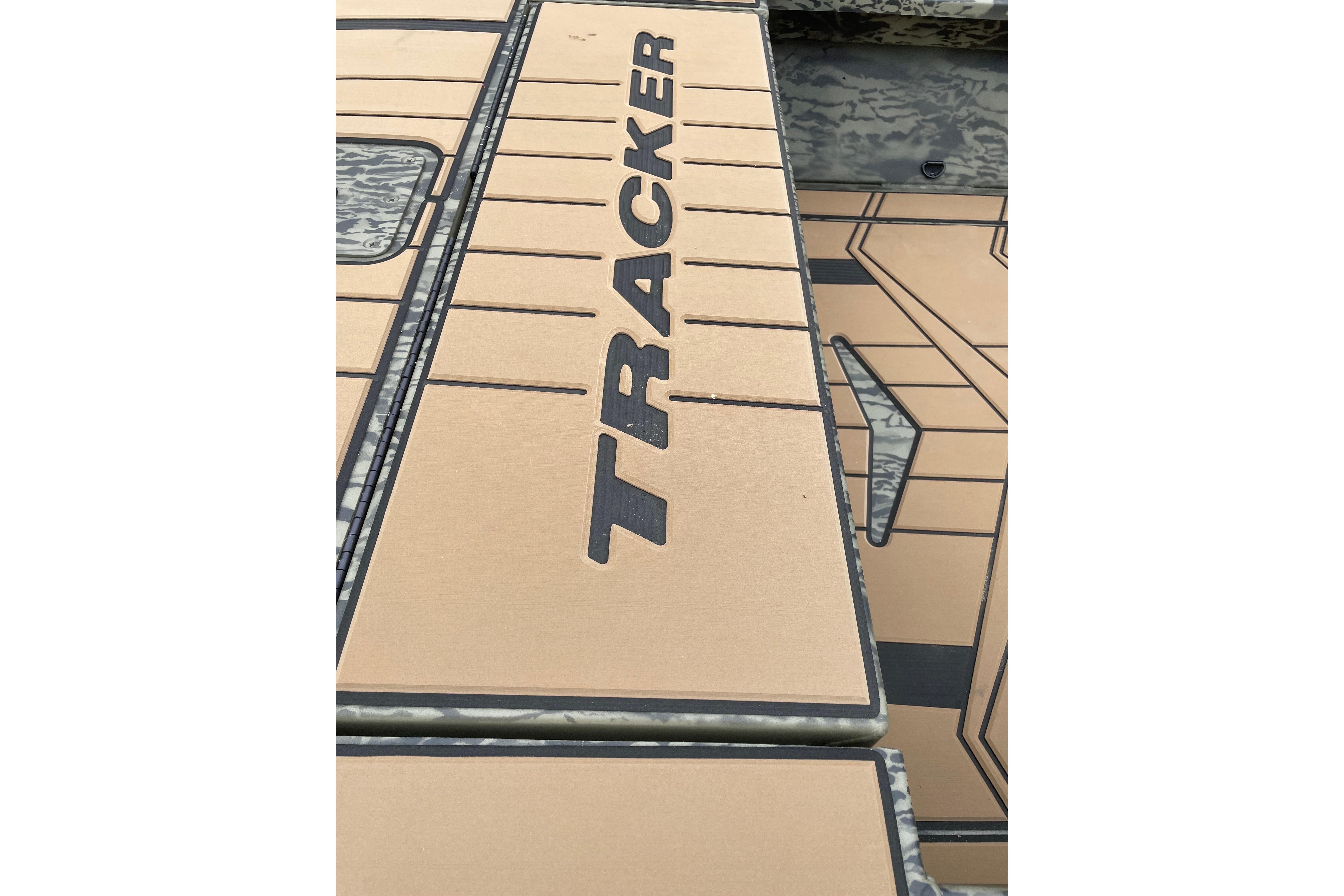 2026 Tracker Grizzly 1756 T Marsh boat deck with logo and camouflage pattern.