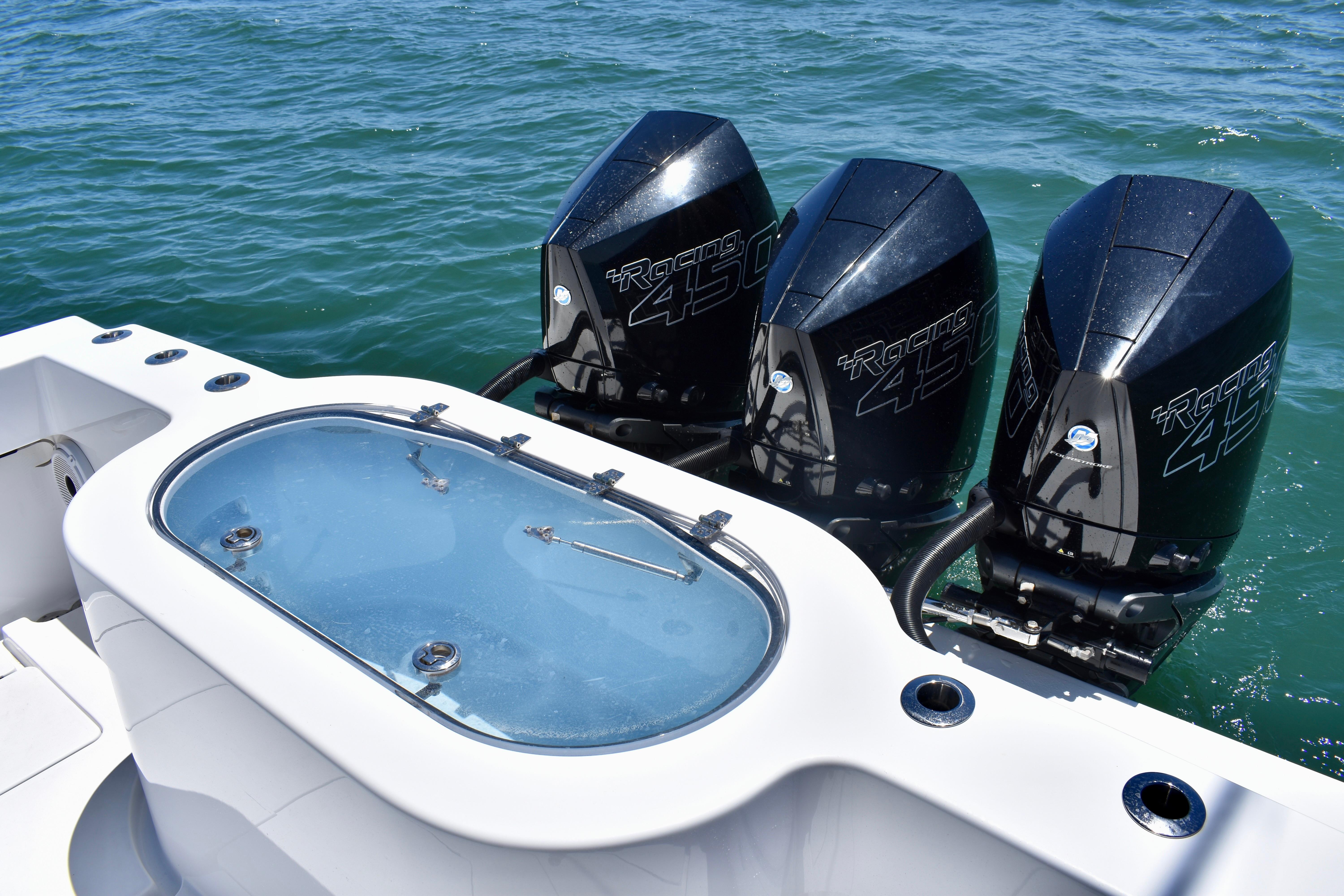 2022 Onslow Bay 41 Tournament boat with triple Racing 450 engines on the water.