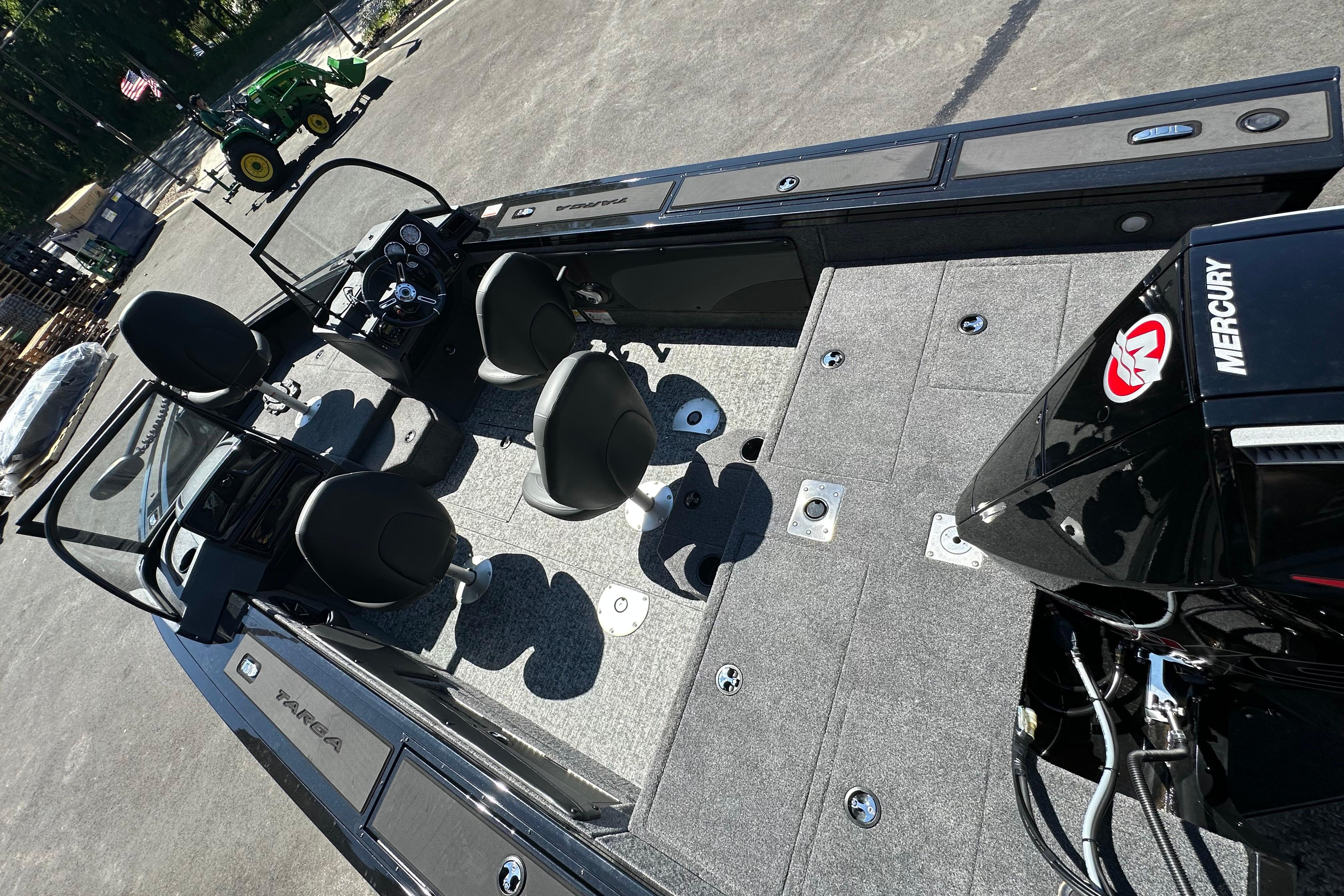 2026 Tracker Targa V-19 WT boat interior with seating and Mercury engine.