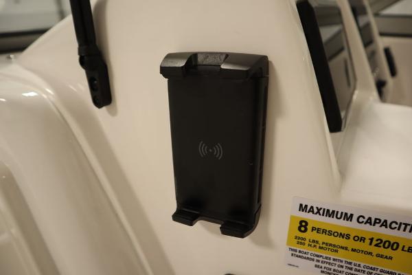 Sea Fox 228 Traveler 2025 boat with phone holder and capacity label.
