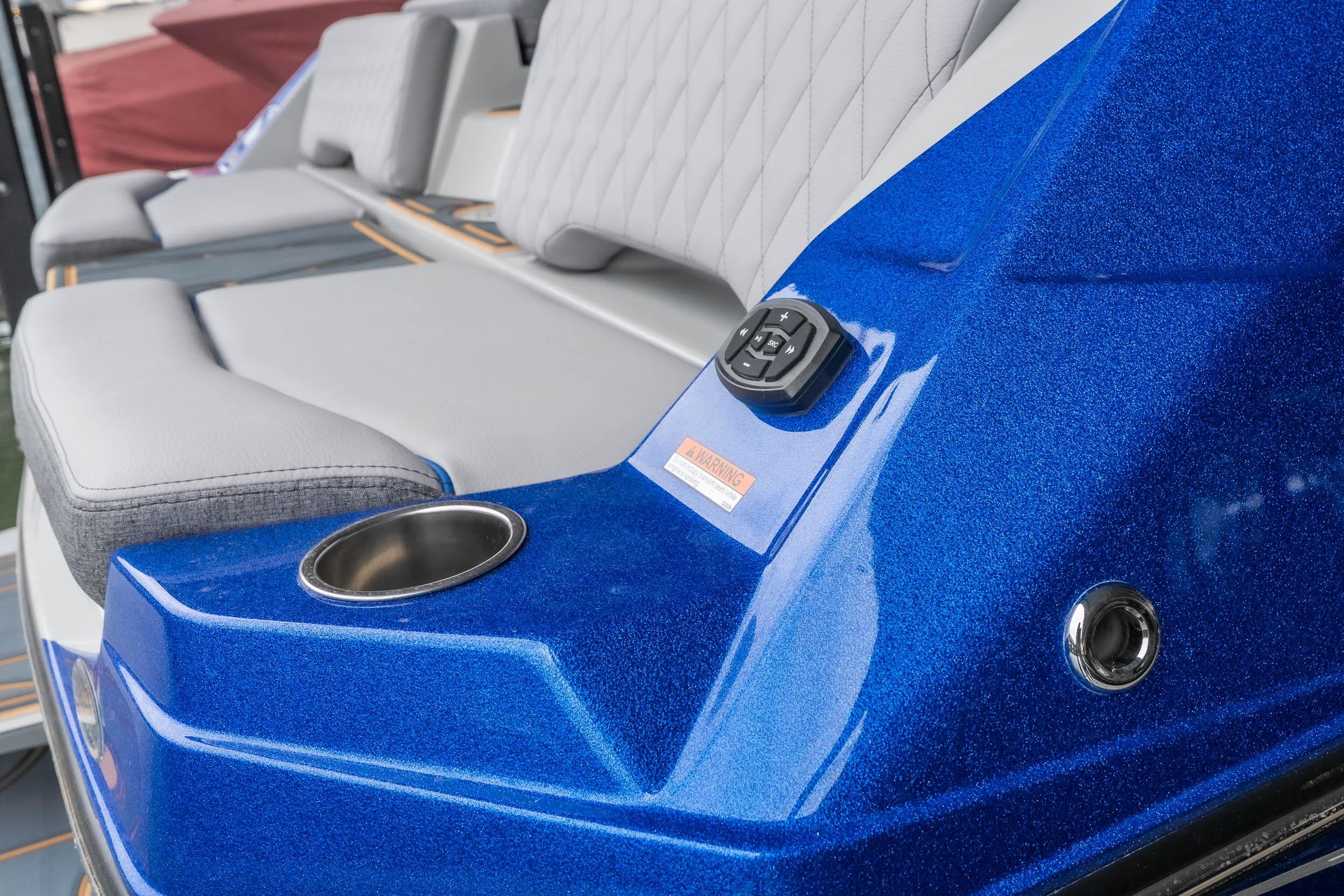 2026 Tigé Z3 boat interior with blue metallic finish and comfortable seating.
