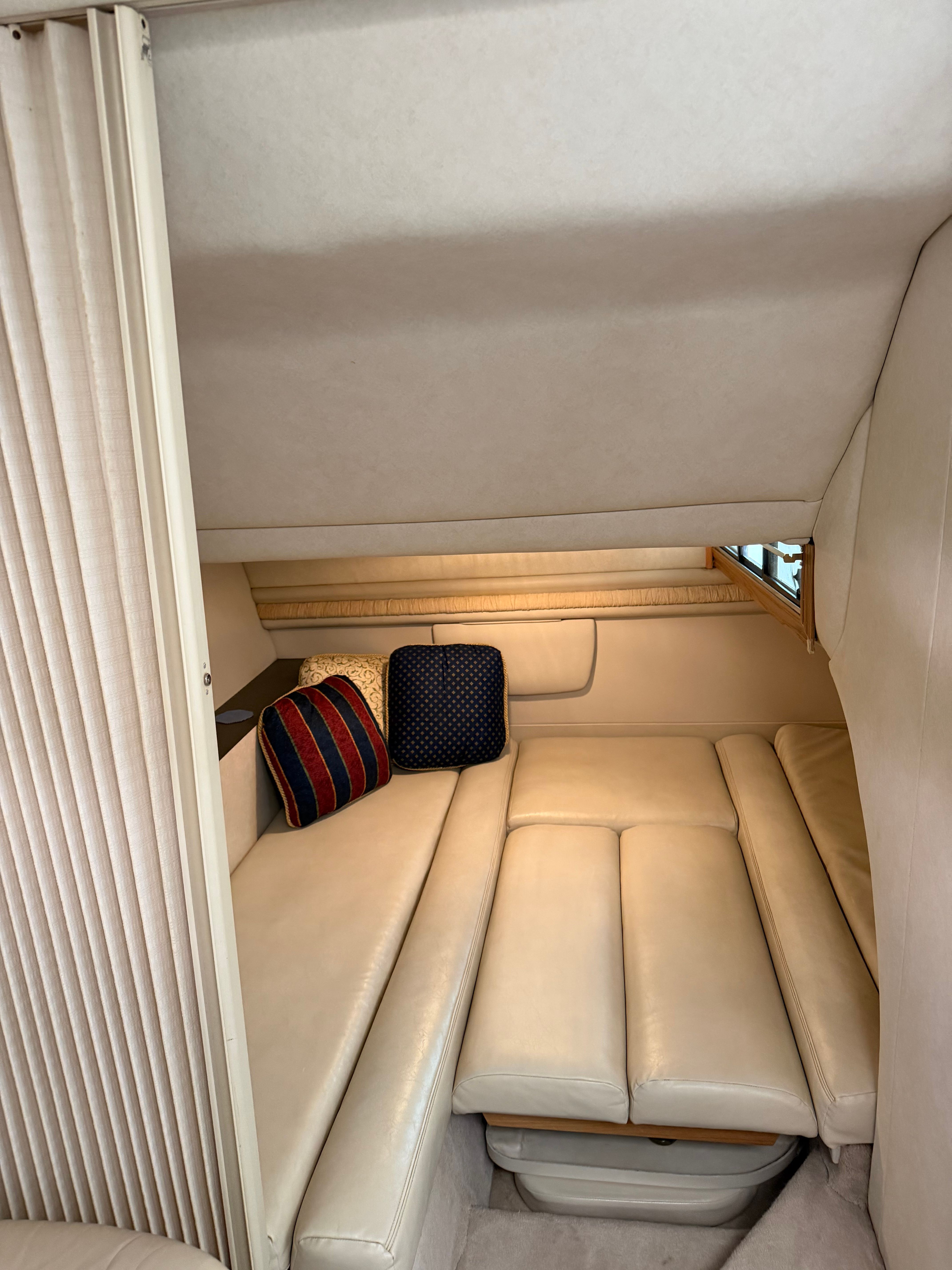 Interior of a 1997 Regal Commodore with beige upholstery.