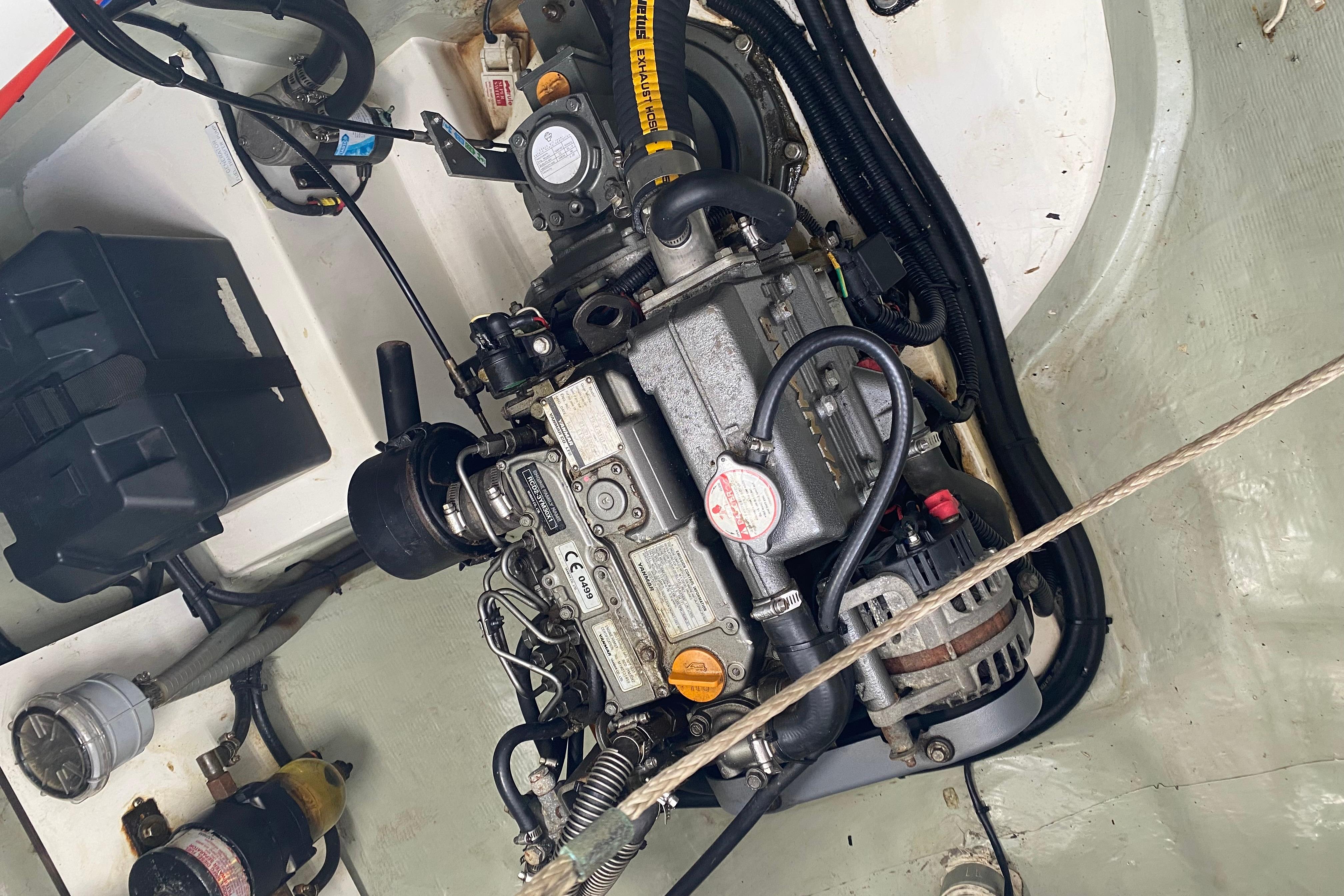 Engine compartment of a 2017 Leopard 40 catamaran, showcasing detailed mechanical components.