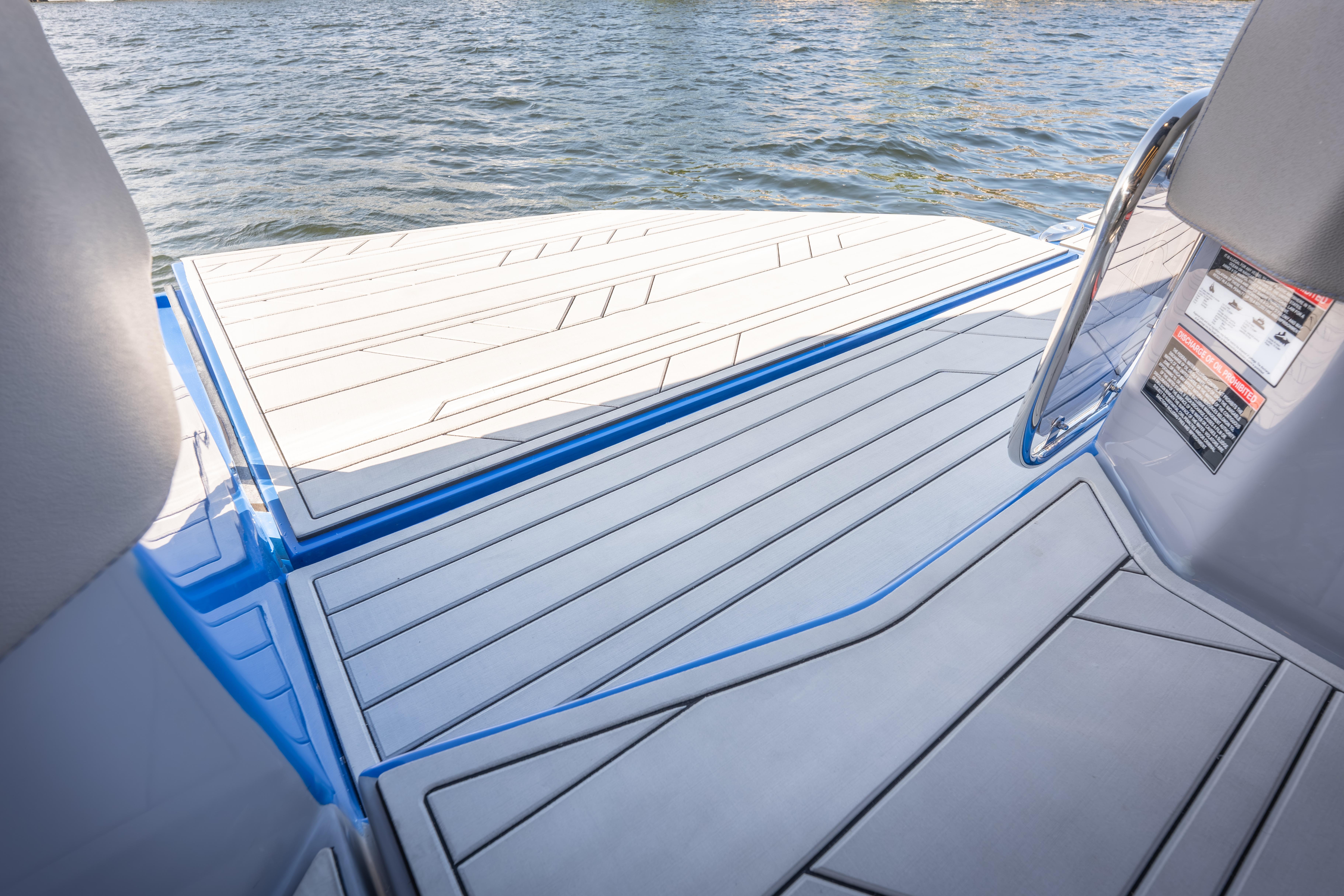 2026 Hanover 347 boat deck with sleek design and water view.