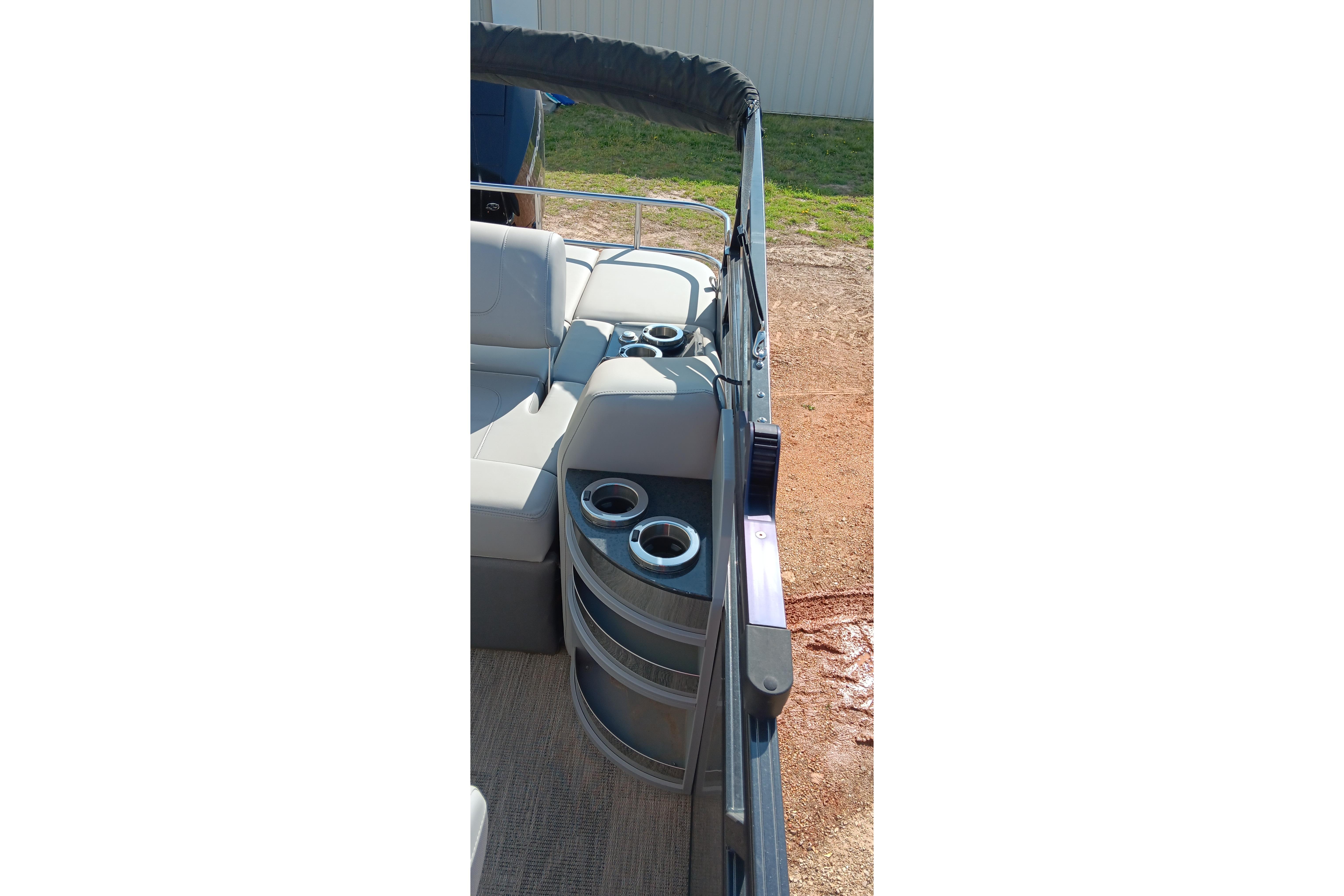 2023 Ranger 2500LS boat interior with cup holders and seating area.