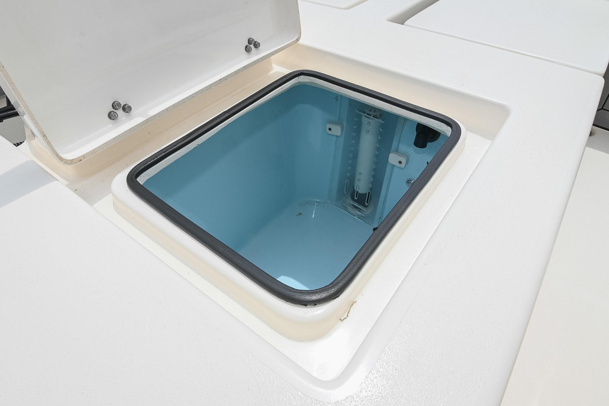 Open storage compartment on 2021 Pathfinder 2200 TRS boat.