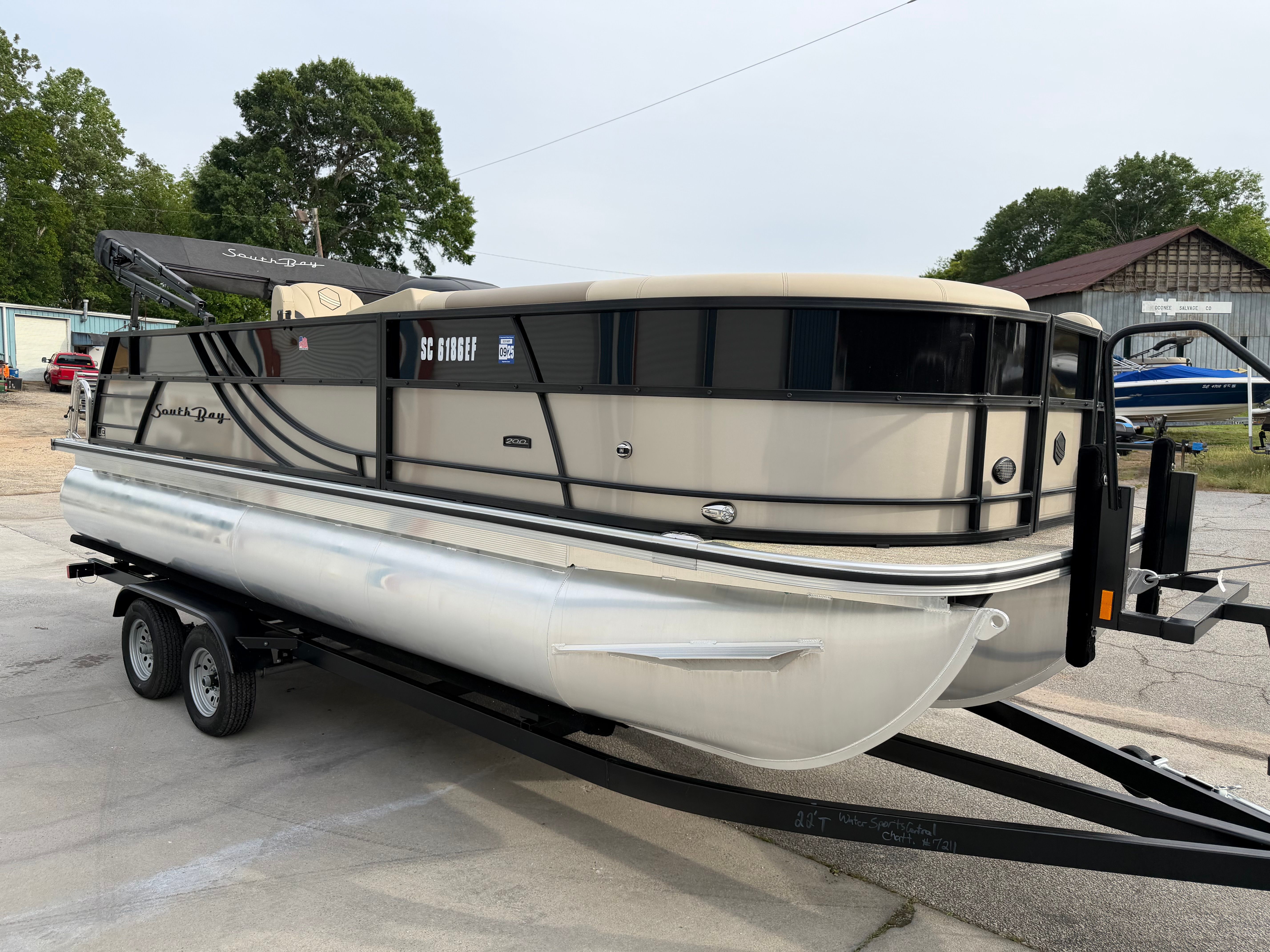 2023 South Bay S222 CR2 pontoon boat on trailer.