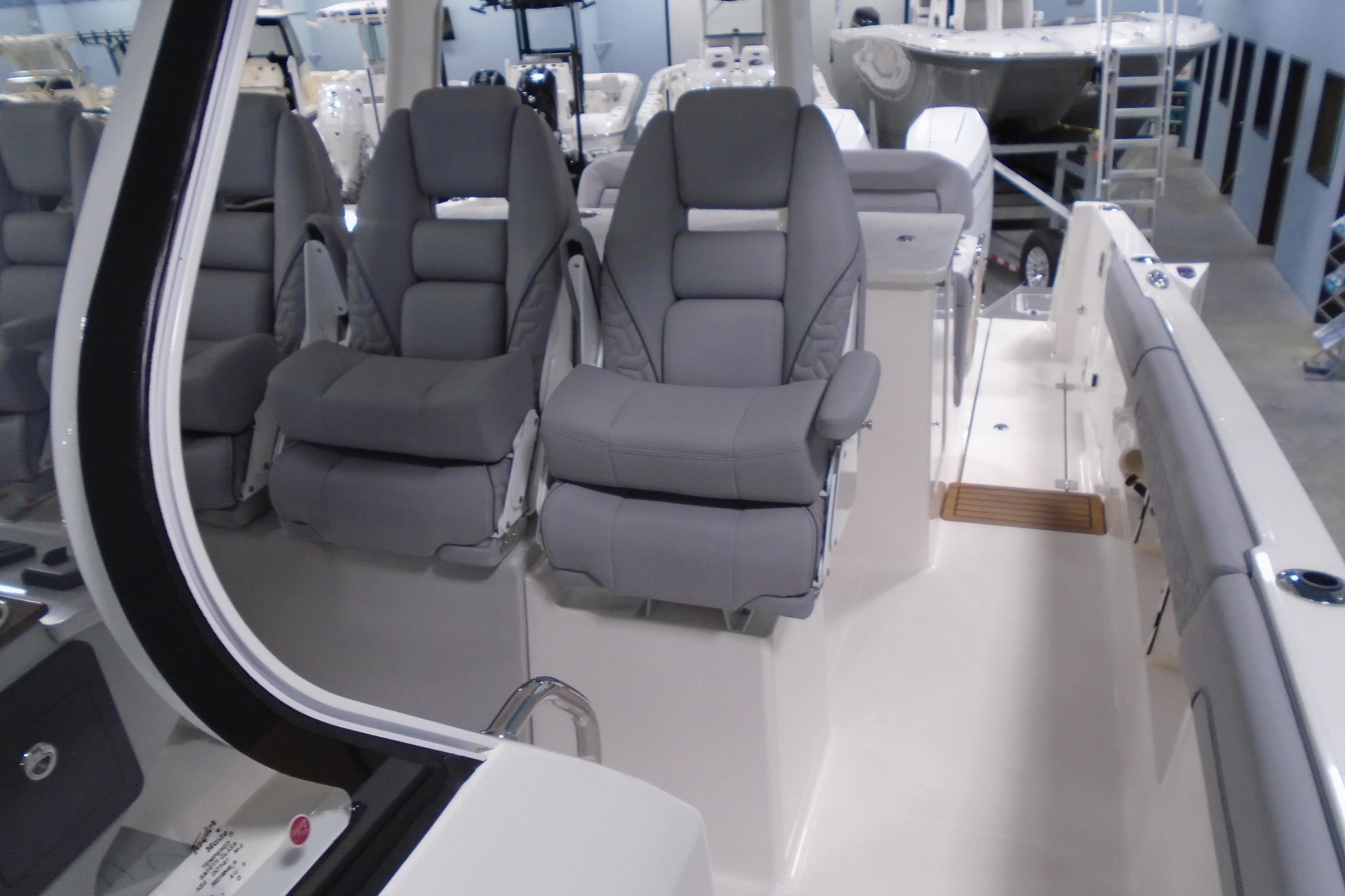 2026 Regal 38 SAV boat interior with luxurious gray seating and modern design.