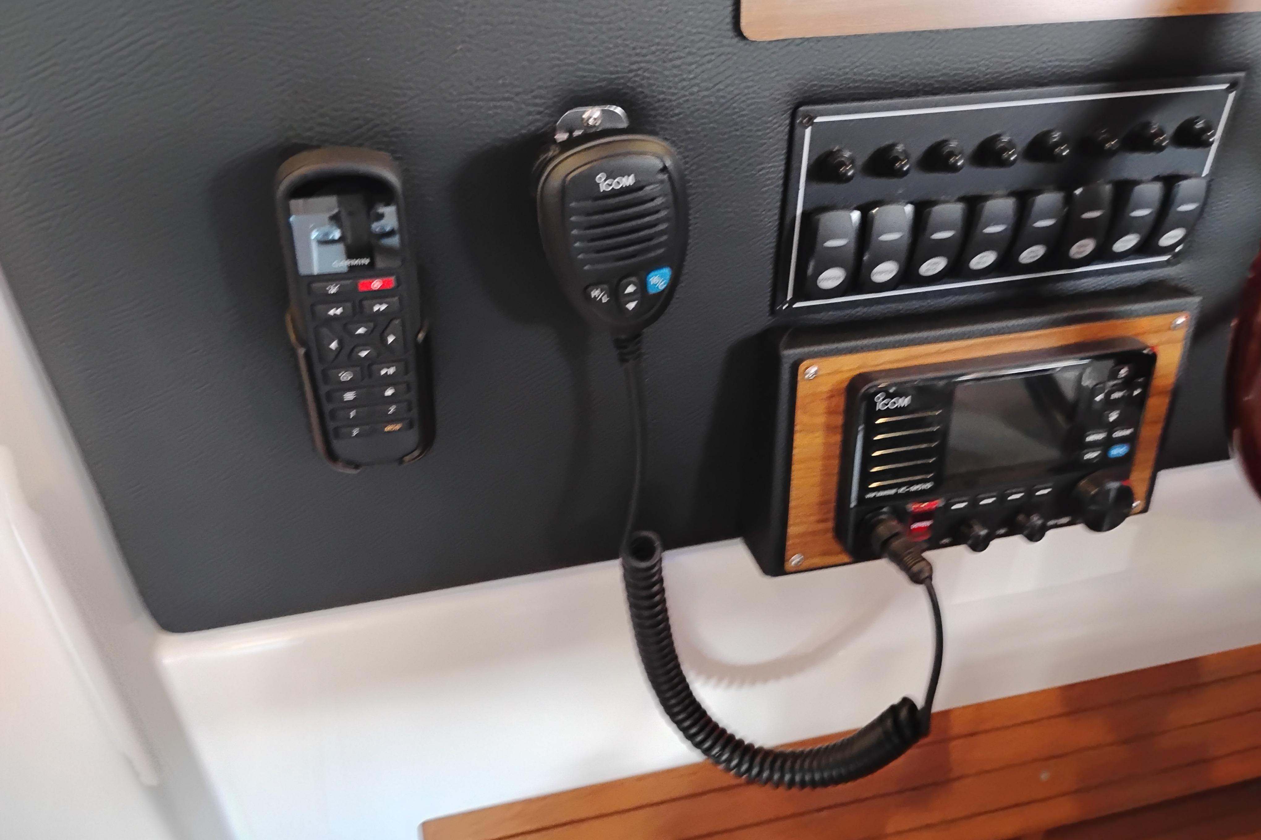 2022 Cutwater C-32 Coupe dashboard with communication devices and control panel.