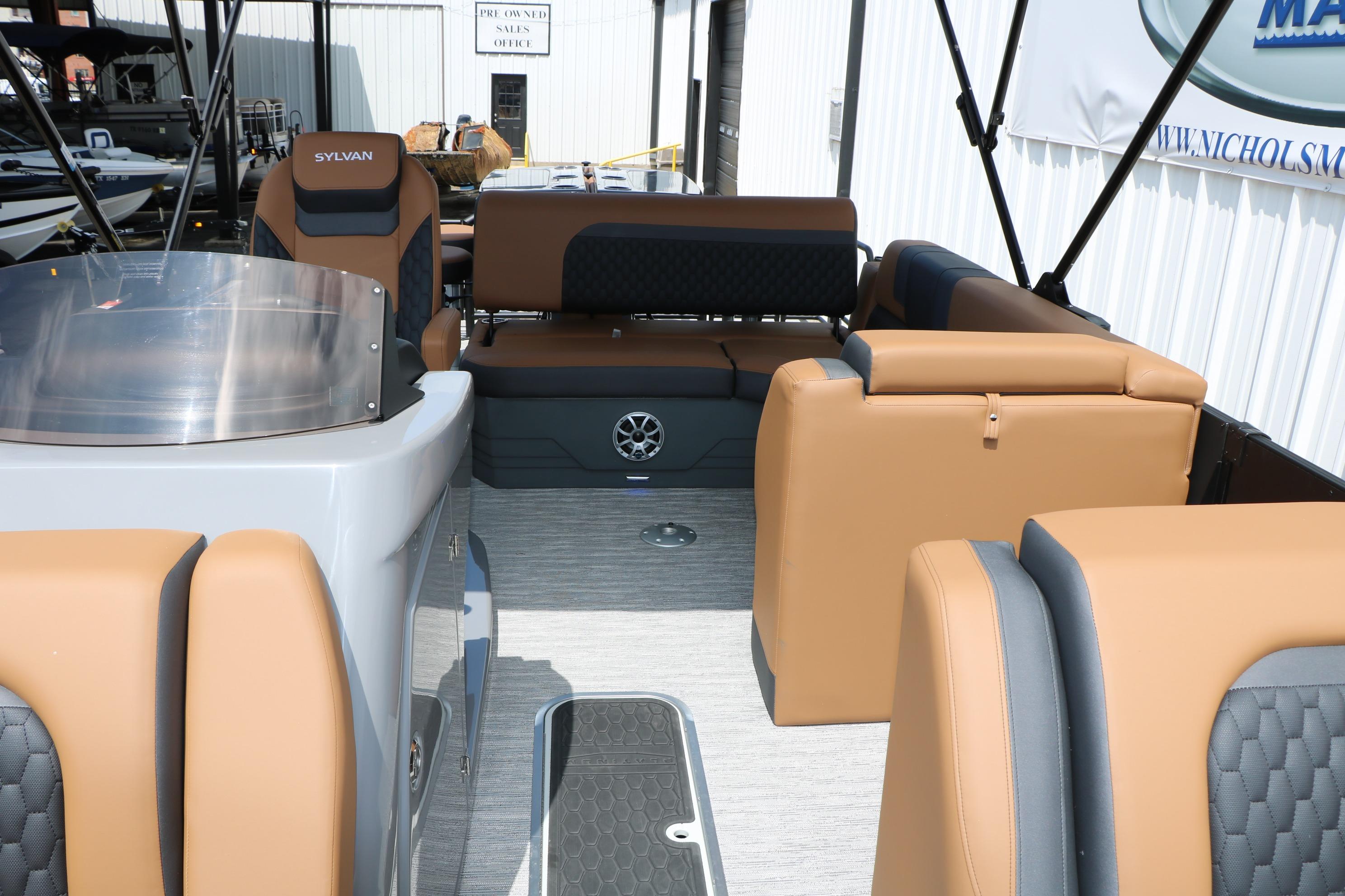 2026 Sylvan L3 DLZ Bar Platinum Edition Tri-Toon interior with tan and gray seating.