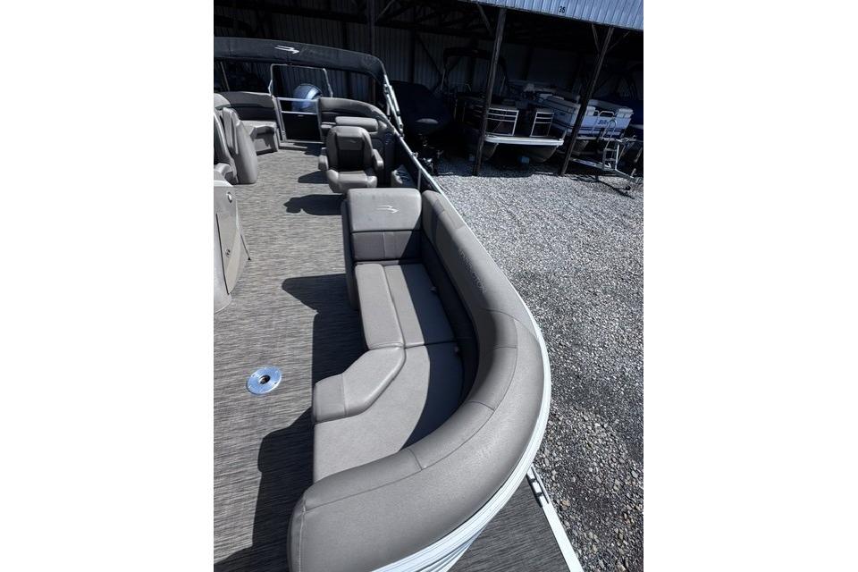 2021 Bennington 23 SSRX pontoon boat with spacious seating and modern design.