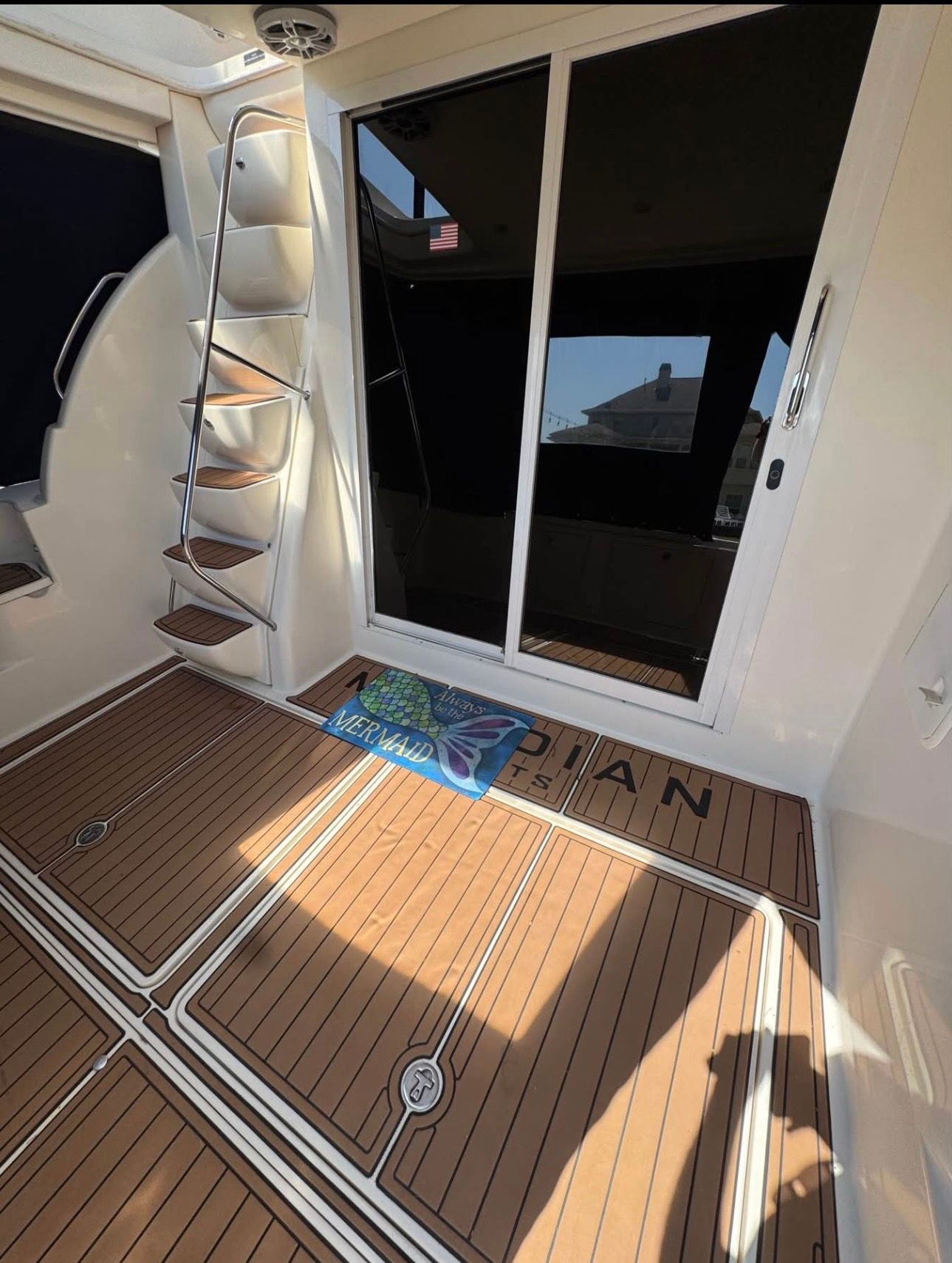 Interior of a 2007 Meridian 411 Sedan yacht with wood decor.