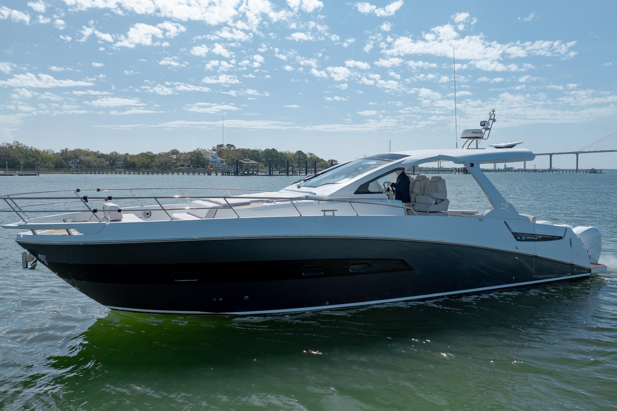 2019 Azimut Verve 40 yacht cruising on a sunny day with scenic background.