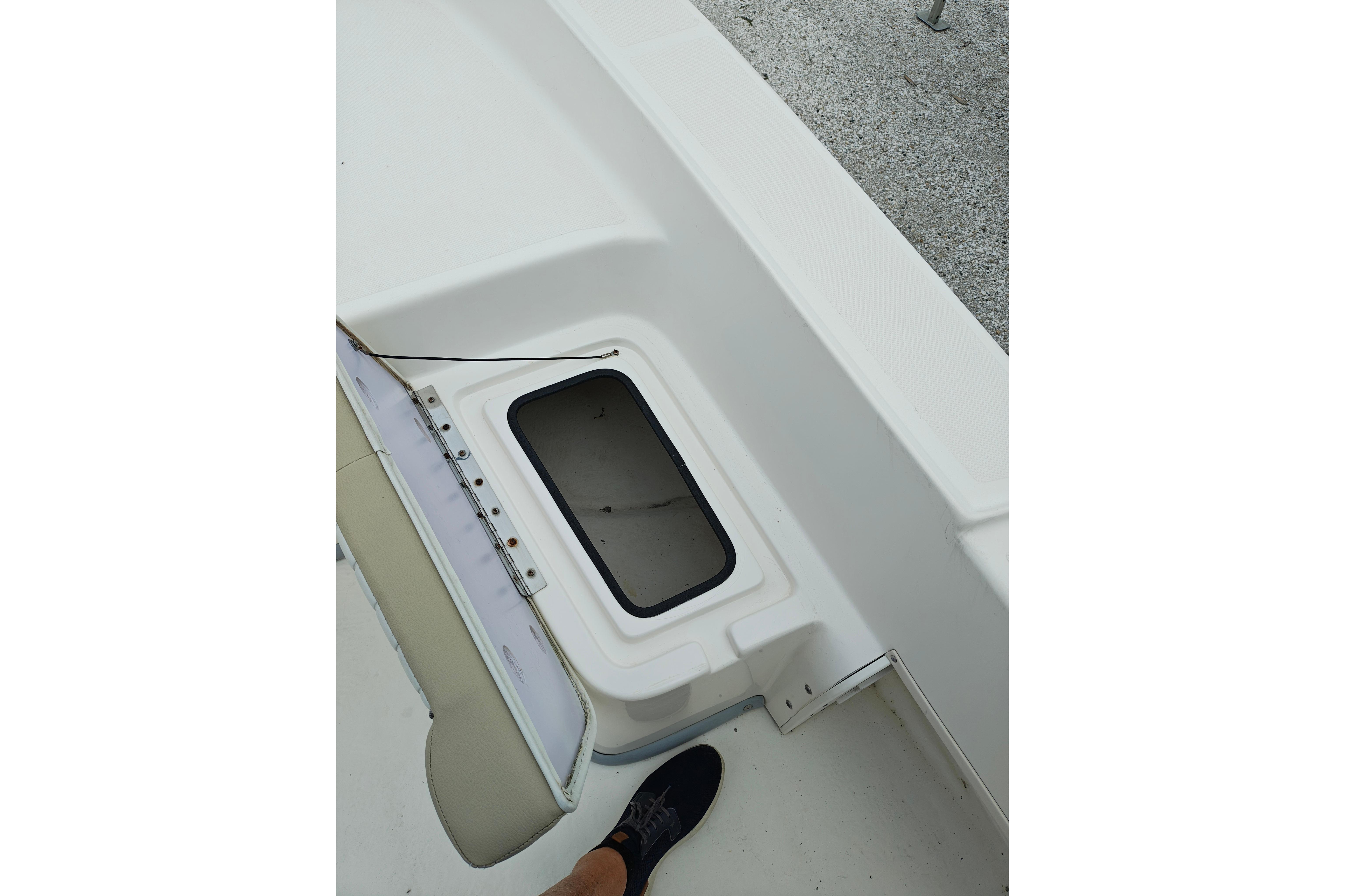 Open storage compartment on 2018 Sundance B20CCR boat deck.