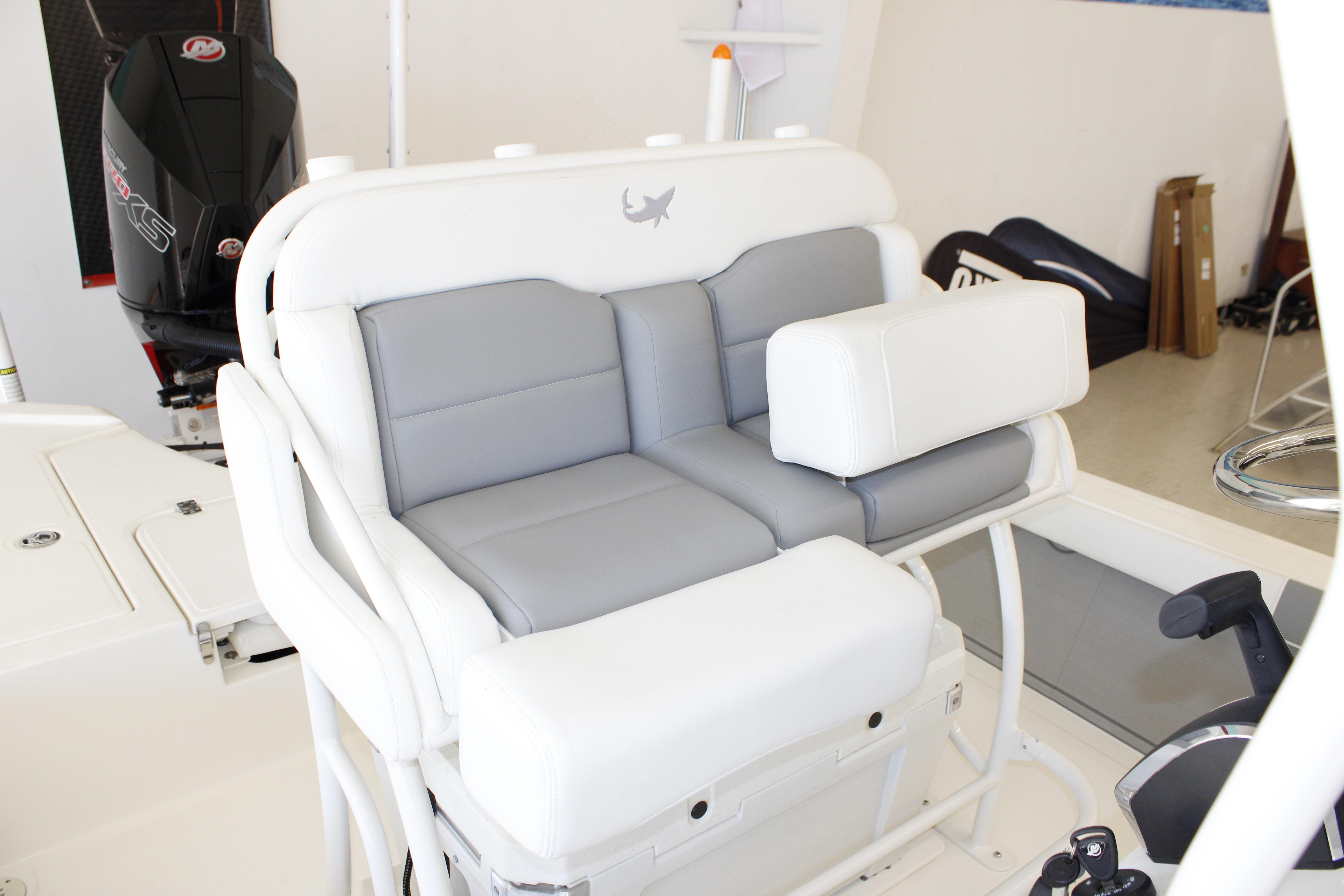 2026 Mako 24 APEX boat interior with cushioned seating and modern design.