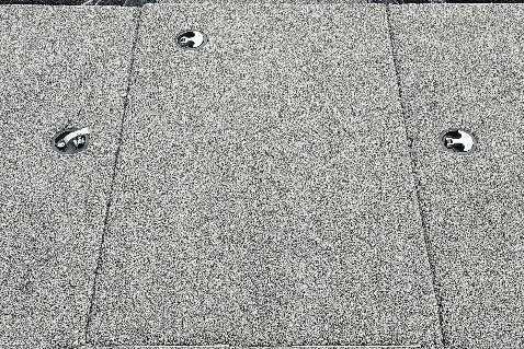 Gray textured surface with metal fixtures, Nitro Z17 2026 model.