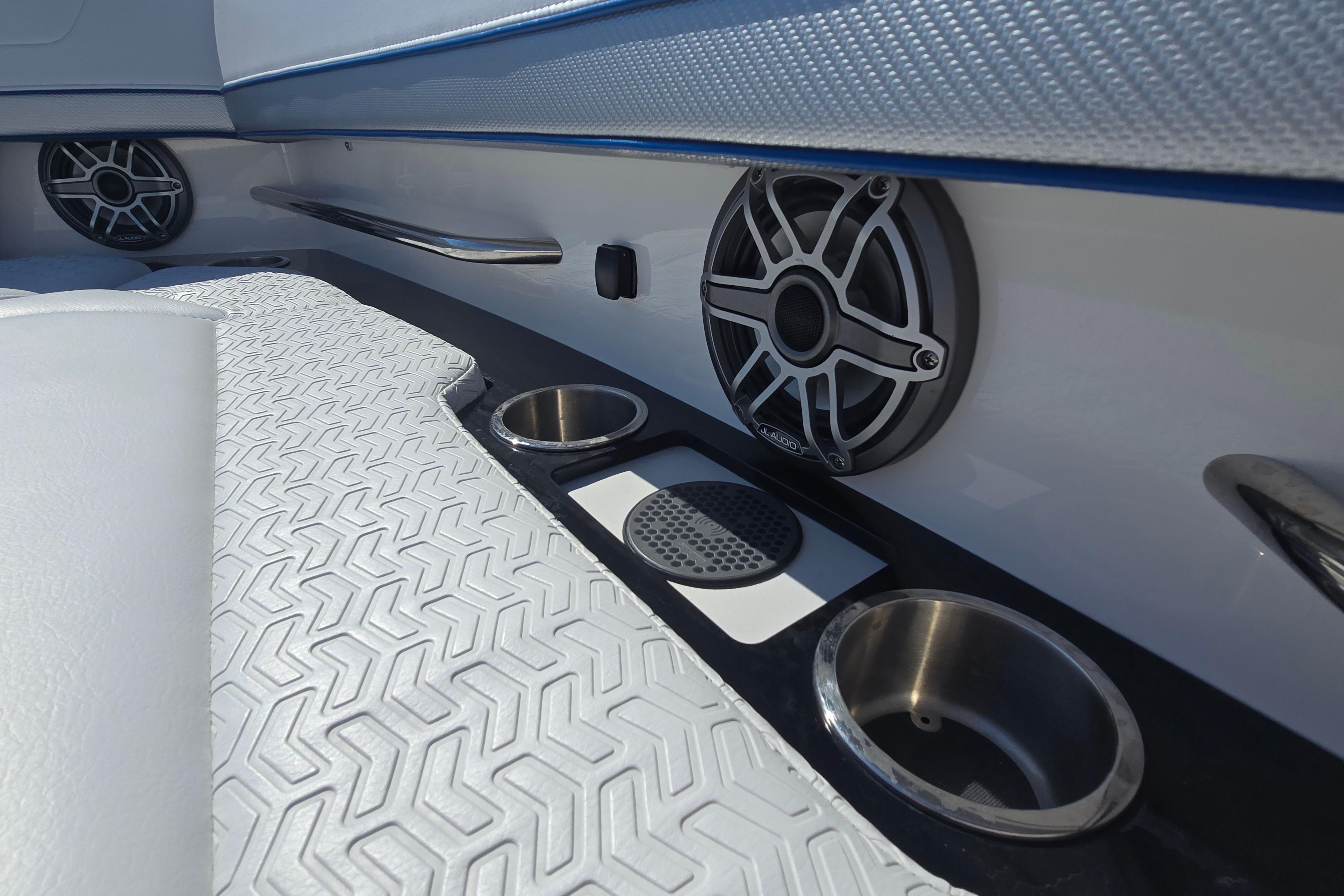 Interior of 2025 Formula 380 Super Sport Crossover OB with speaker and cup holders.