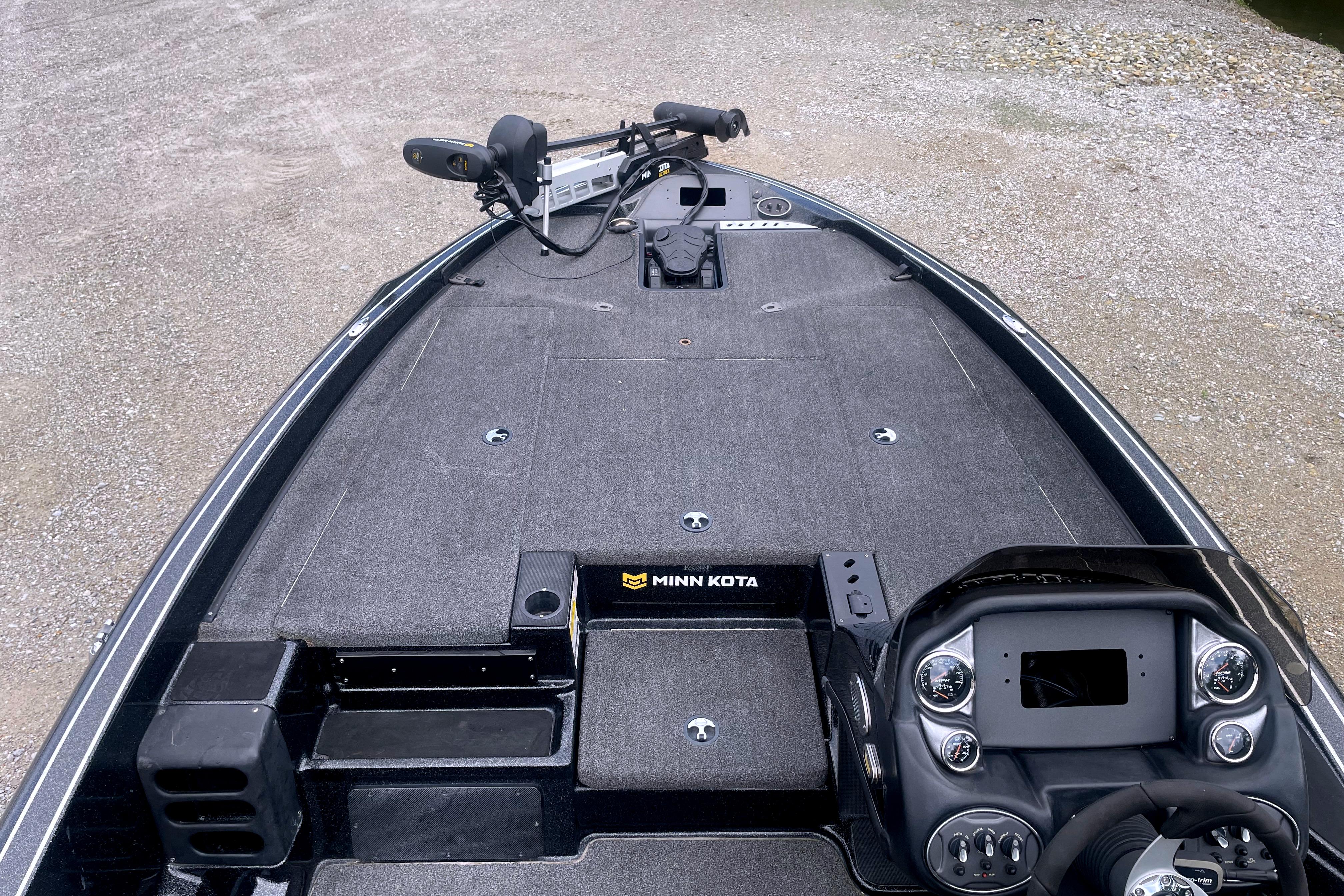 2022 Triton 18 TrX boat deck with Minn Kota trolling motor and control panel.