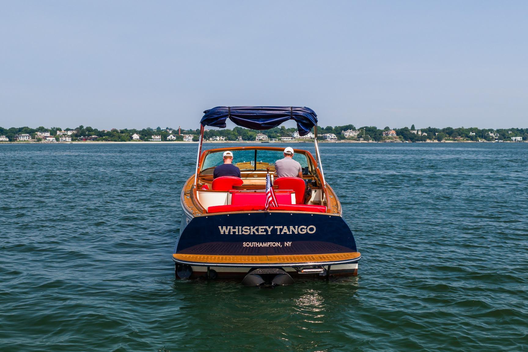 2005 Hinckley Talaria 29R boat named "Whiskey Tango" on water near Southampton, NY.