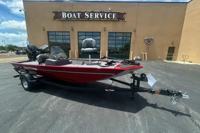 2026 Tracker Bass Tracker Classic XL boat parked outside a boat service center.