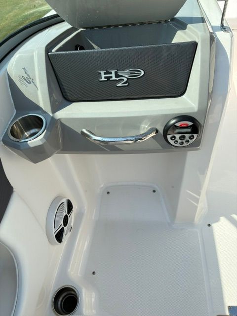 Close-up of the cockpit area in a 2012 Chaparral 19 H2O Sport boat.
