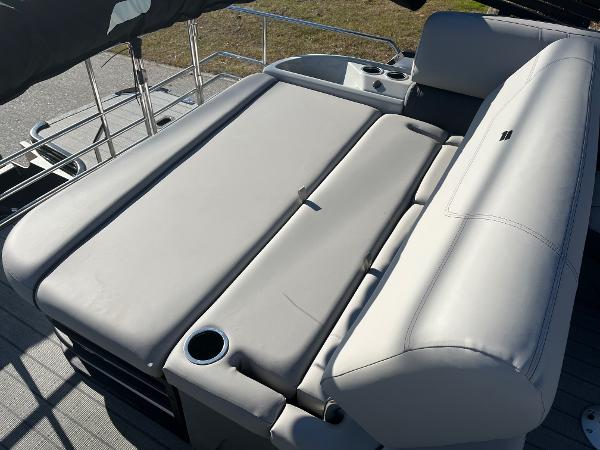 2024 Starcraft SLS3 boat with spacious, cushioned seating and cup holders.
