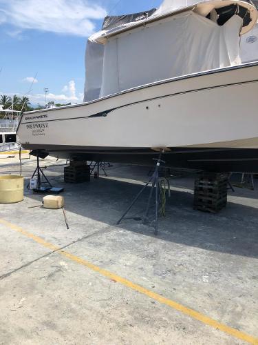 2006 Grady-White Bimini 306 boat on dry dock for maintenance.