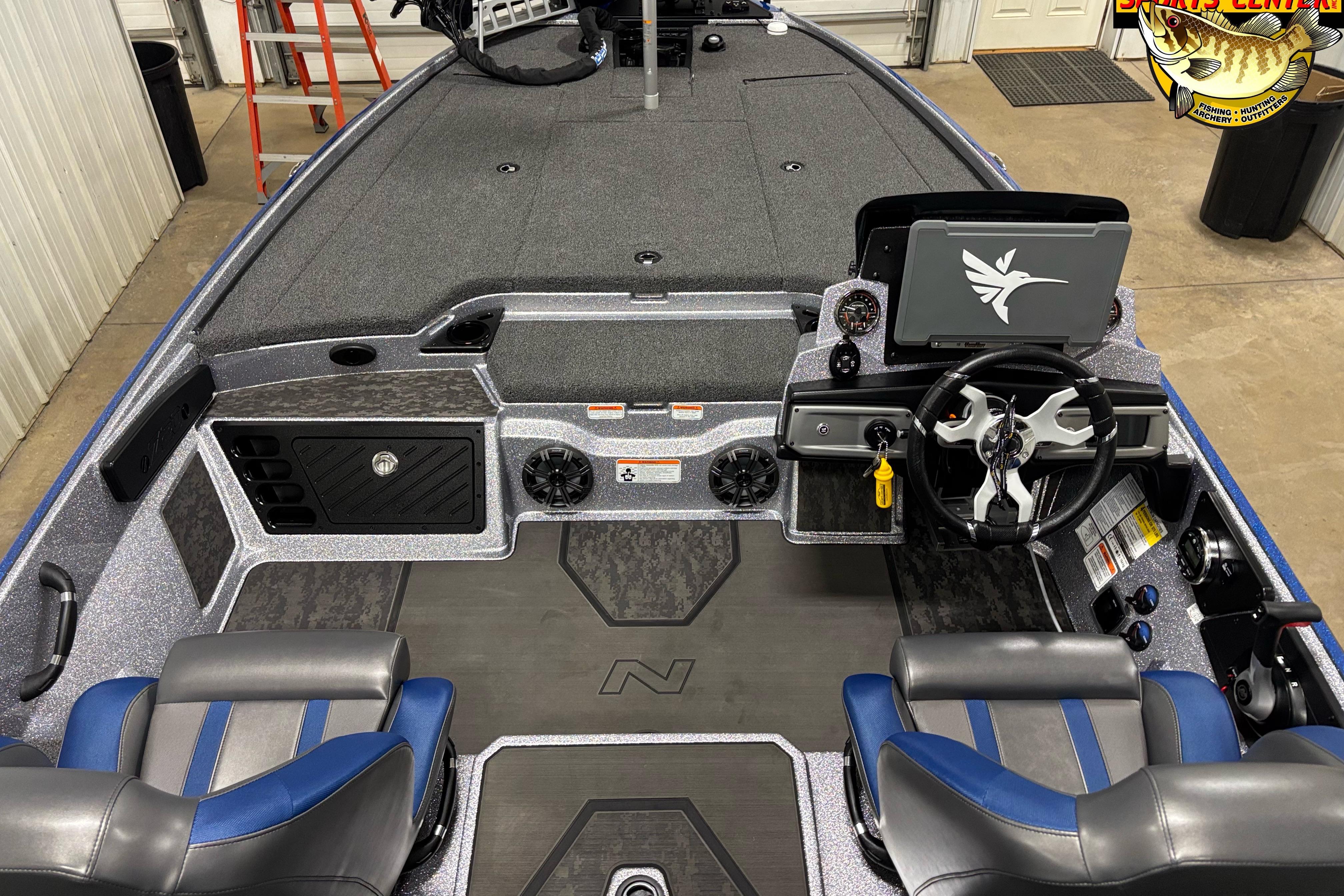 2026 Nitro Z20 XL boat interior with steering wheel, seats, and control panel.
