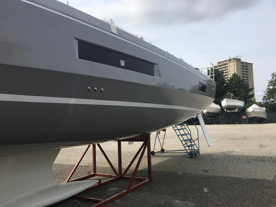 2025 Beneteau Oceanis 40.1 yacht on dry dock, side view.