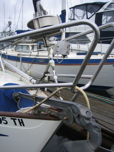 Bow of a 1974 Hallberg-Rassy Rasmus 35 sailboat in harbor.