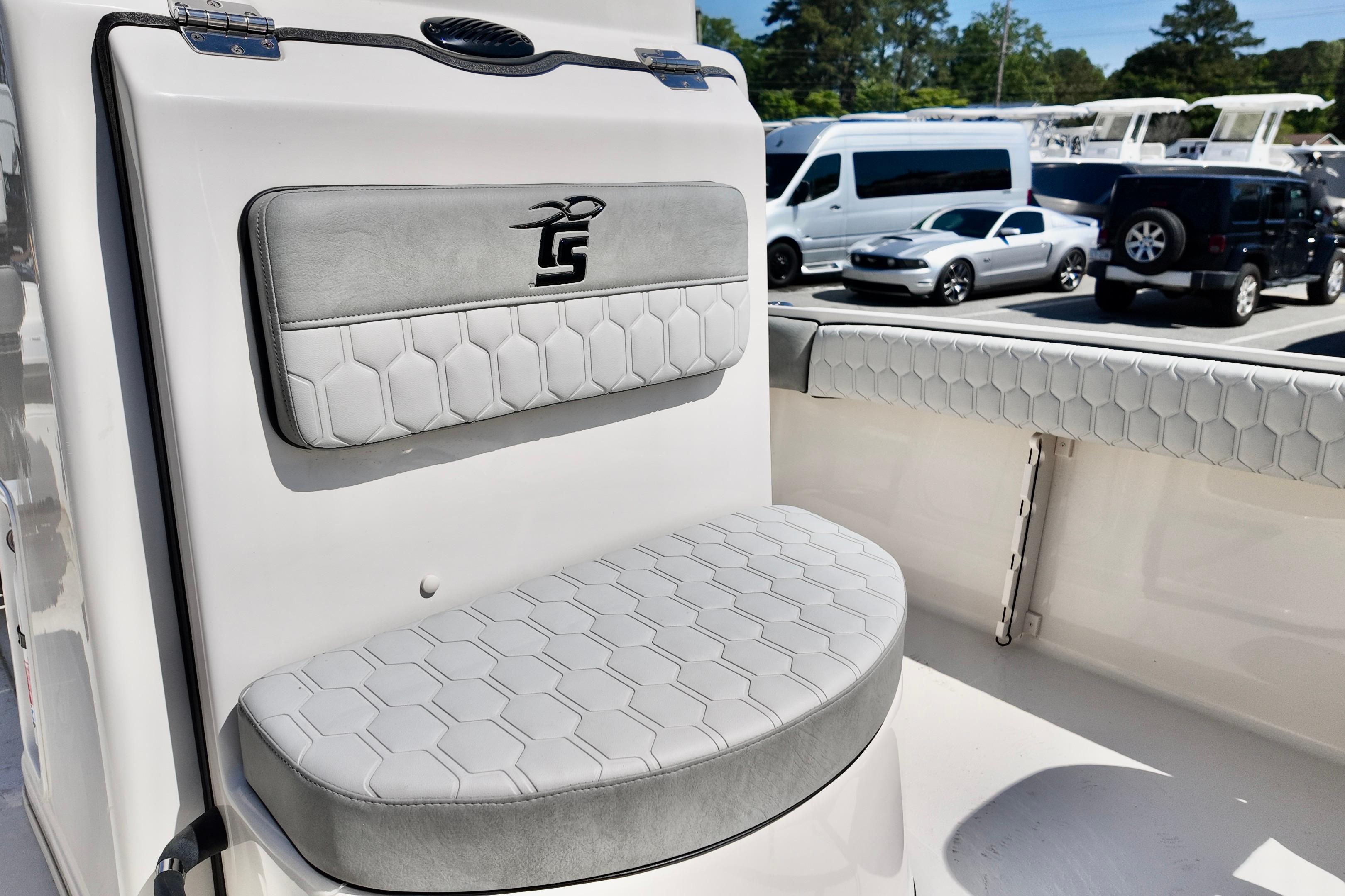 2026 Carolina Skiff 21 Ultra Elite boat seating with hexagonal pattern upholstery.