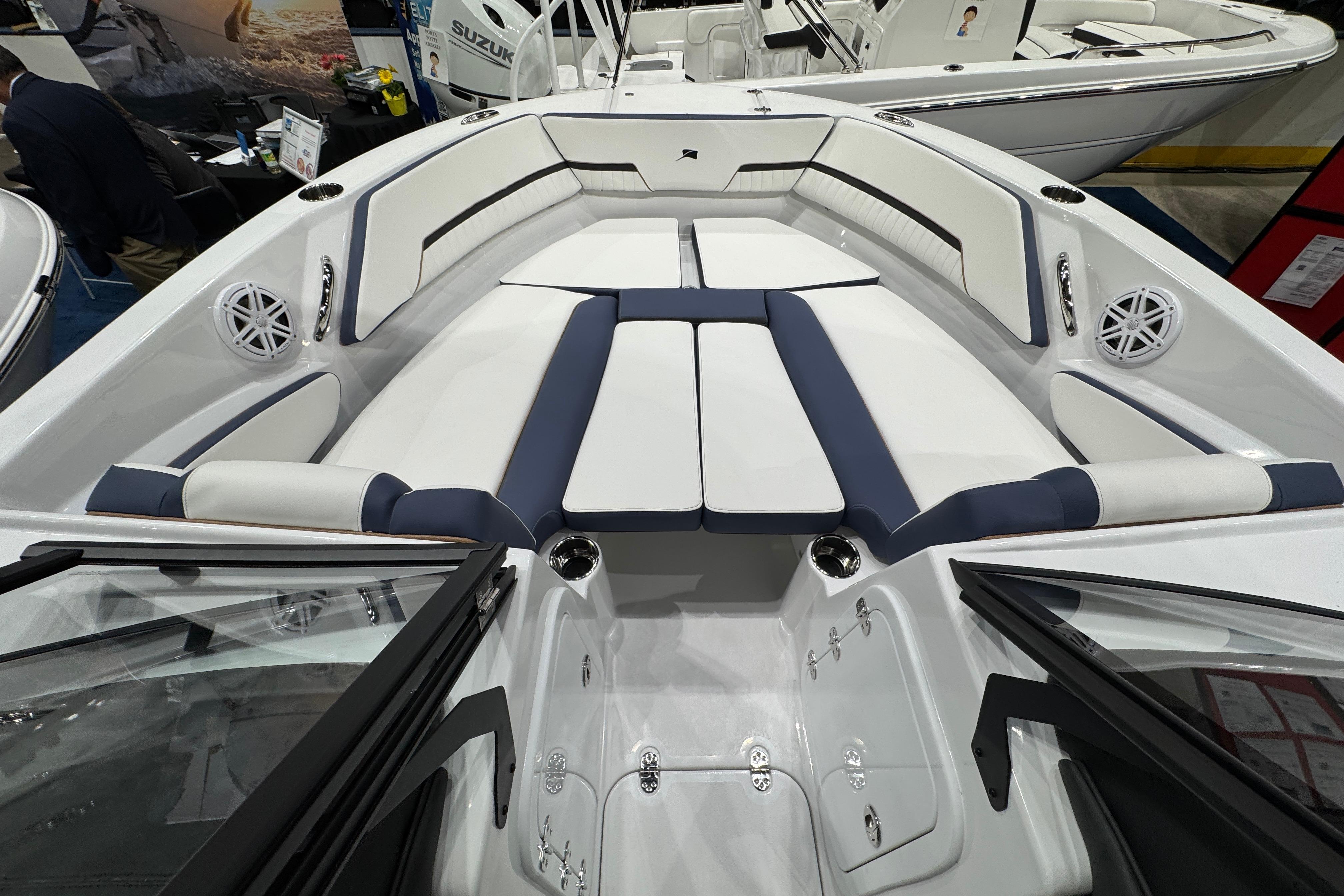 2026 Stingray 20 SBX boat interior with white and navy seating, showcasing modern design.