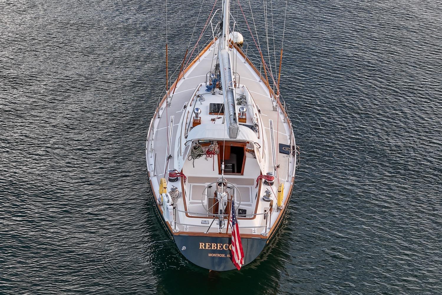 Aerial view of 1989 Hinckley Sou'wester 51 sailboat on calm water.