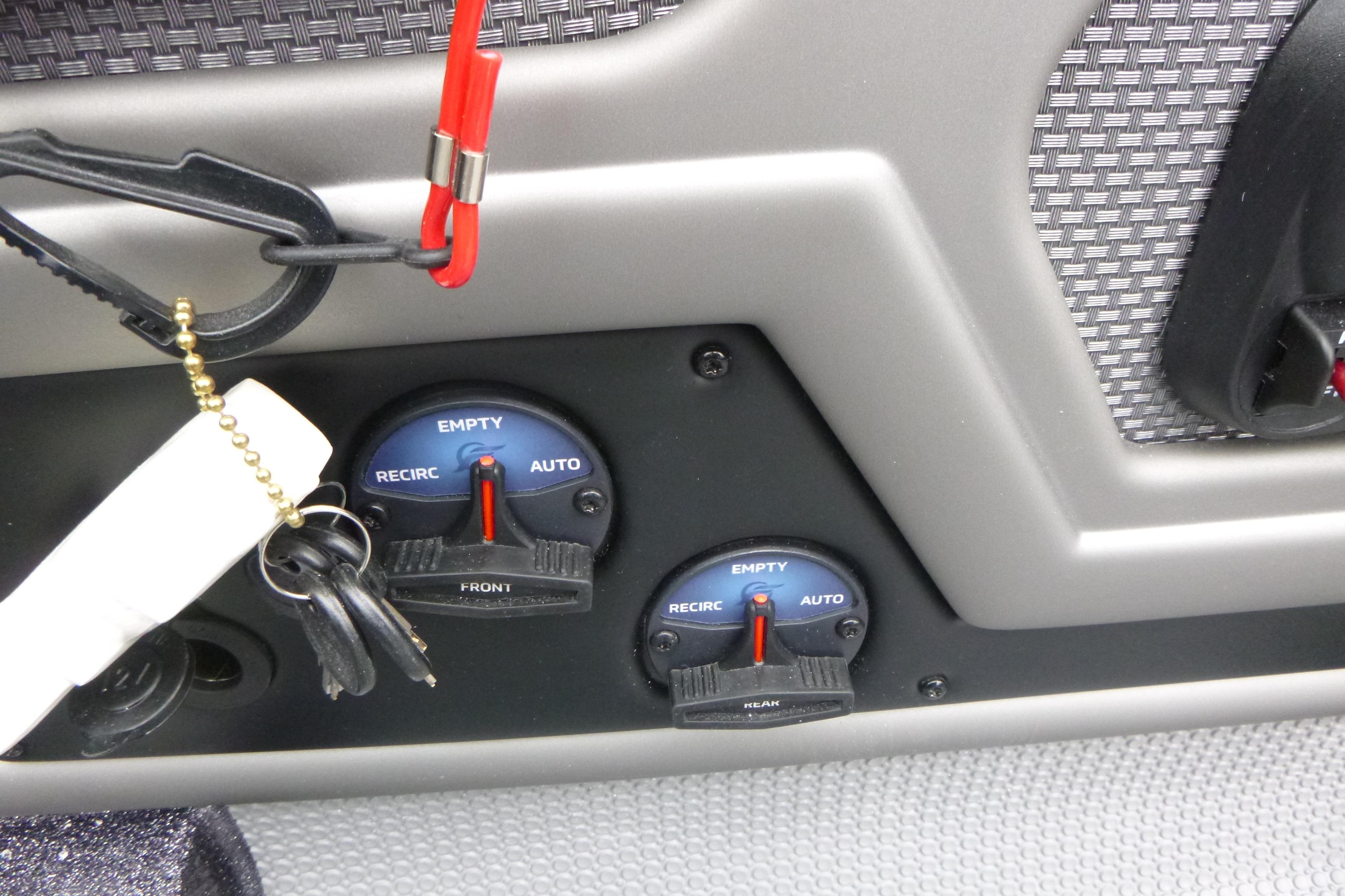 Control panel of 2026 Ranger 620FS Cup Equipped boat with switches and keys.
