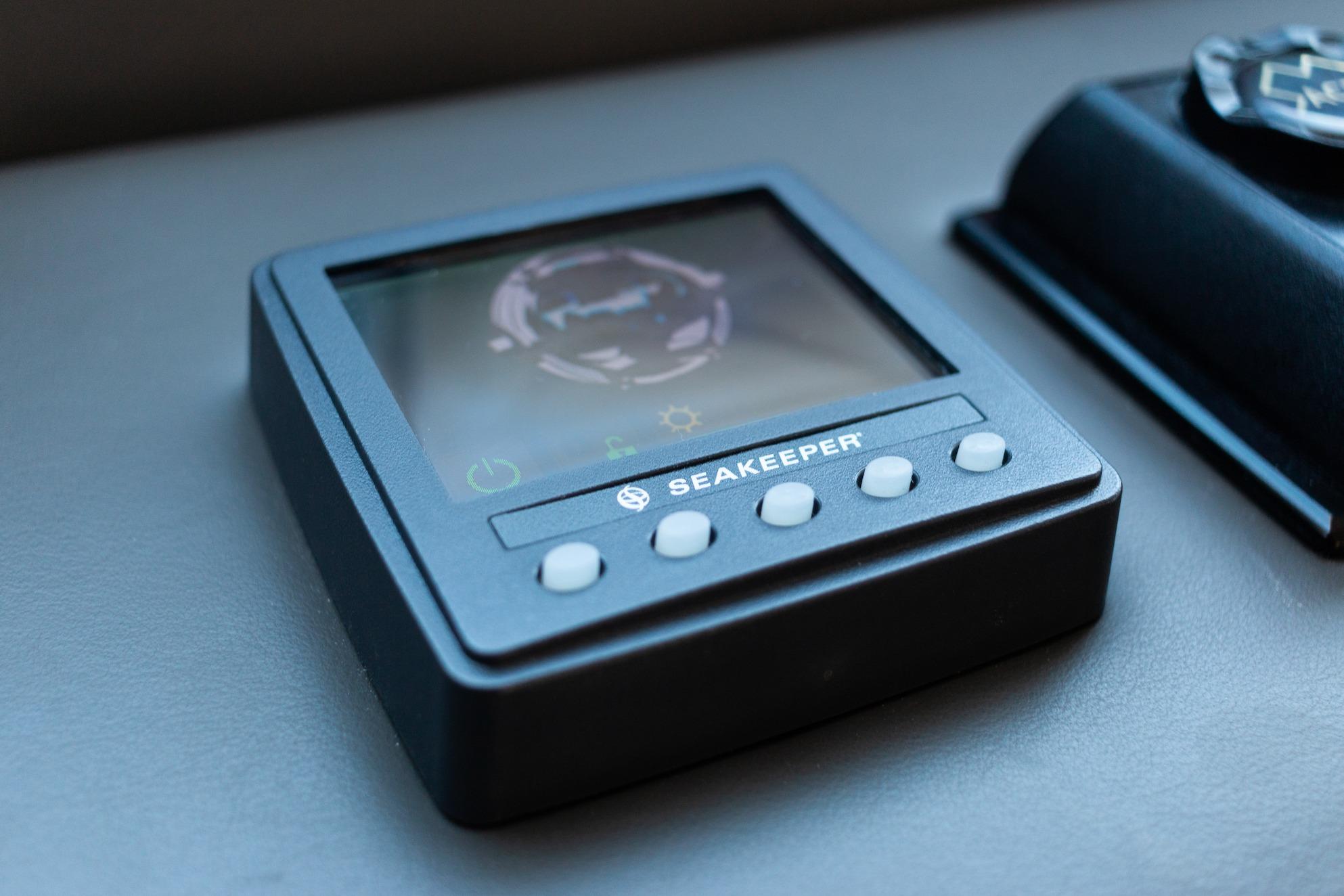 Seakeeper control panel on 2015 Prestige 750 yacht dashboard.