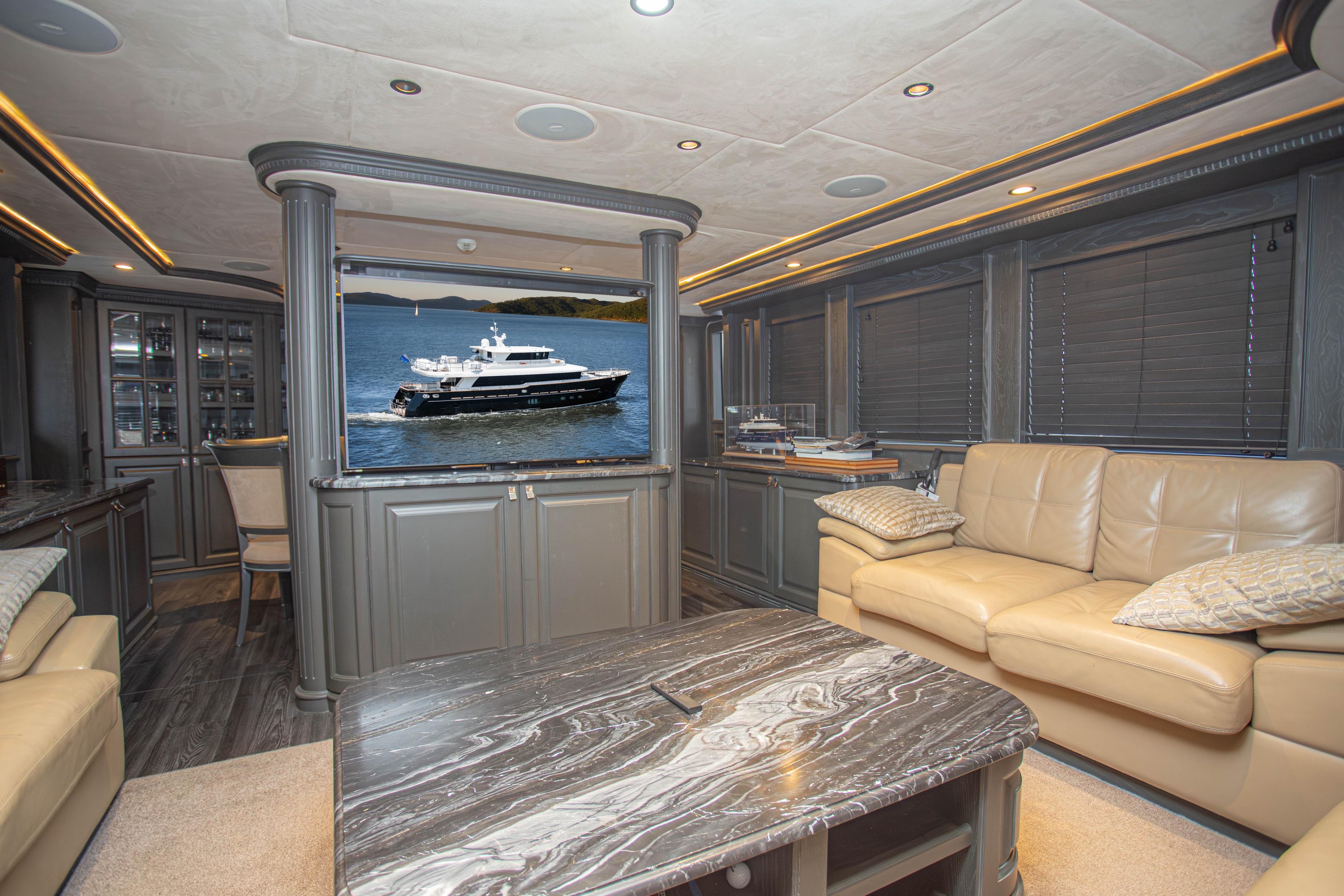 Luxurious interior of 2014 Fifth Ocean Yachts 24m Displacement Explorer Yacht with elegant furnishings.