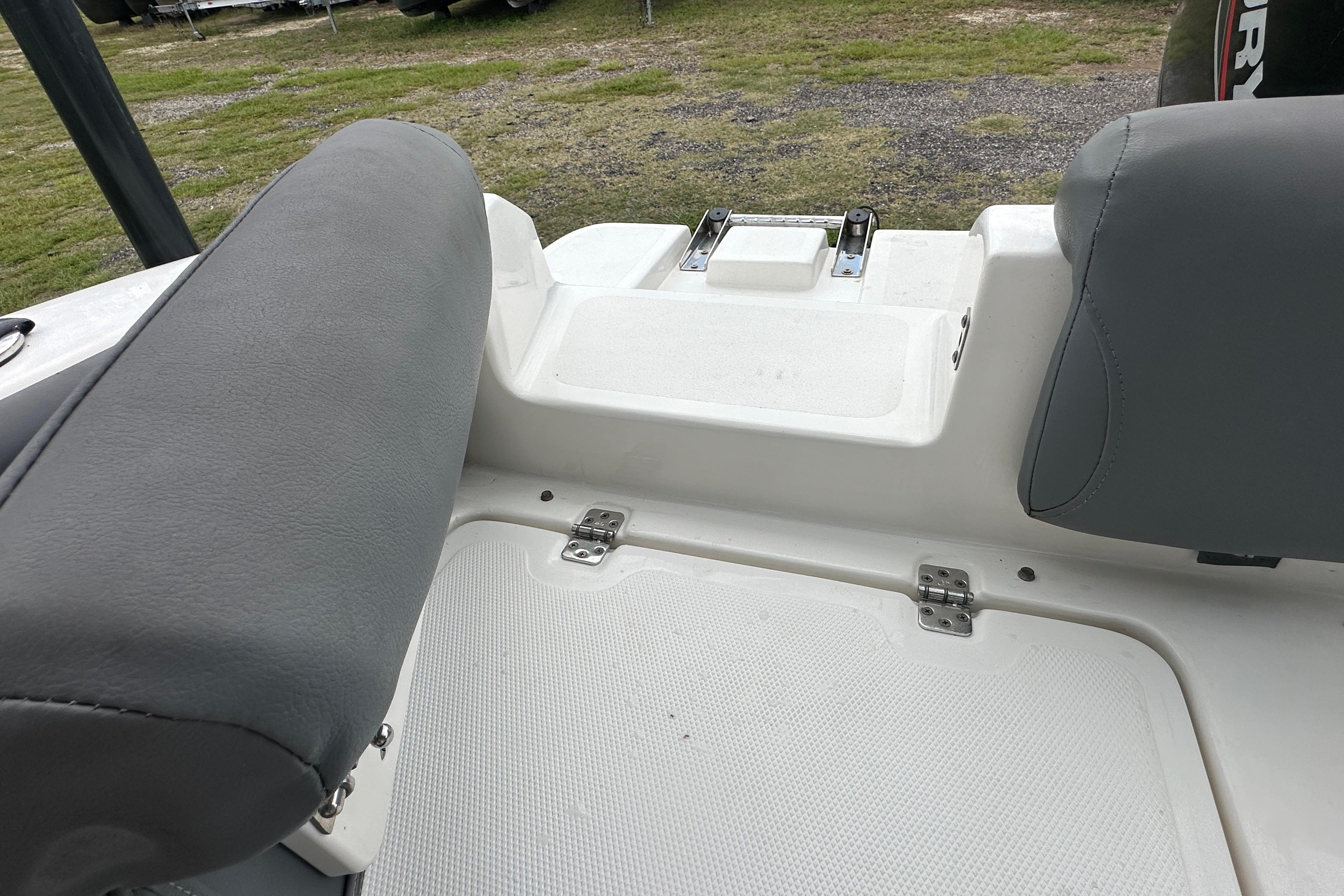 2023 NauticStar 2102 Legacy boat interior seating and storage area.